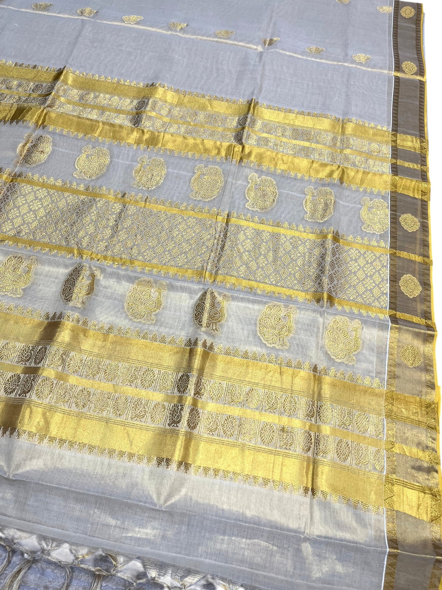 Southloom Kerala Tissue Kasavu Heavy Work Saree with Floral Woven Design