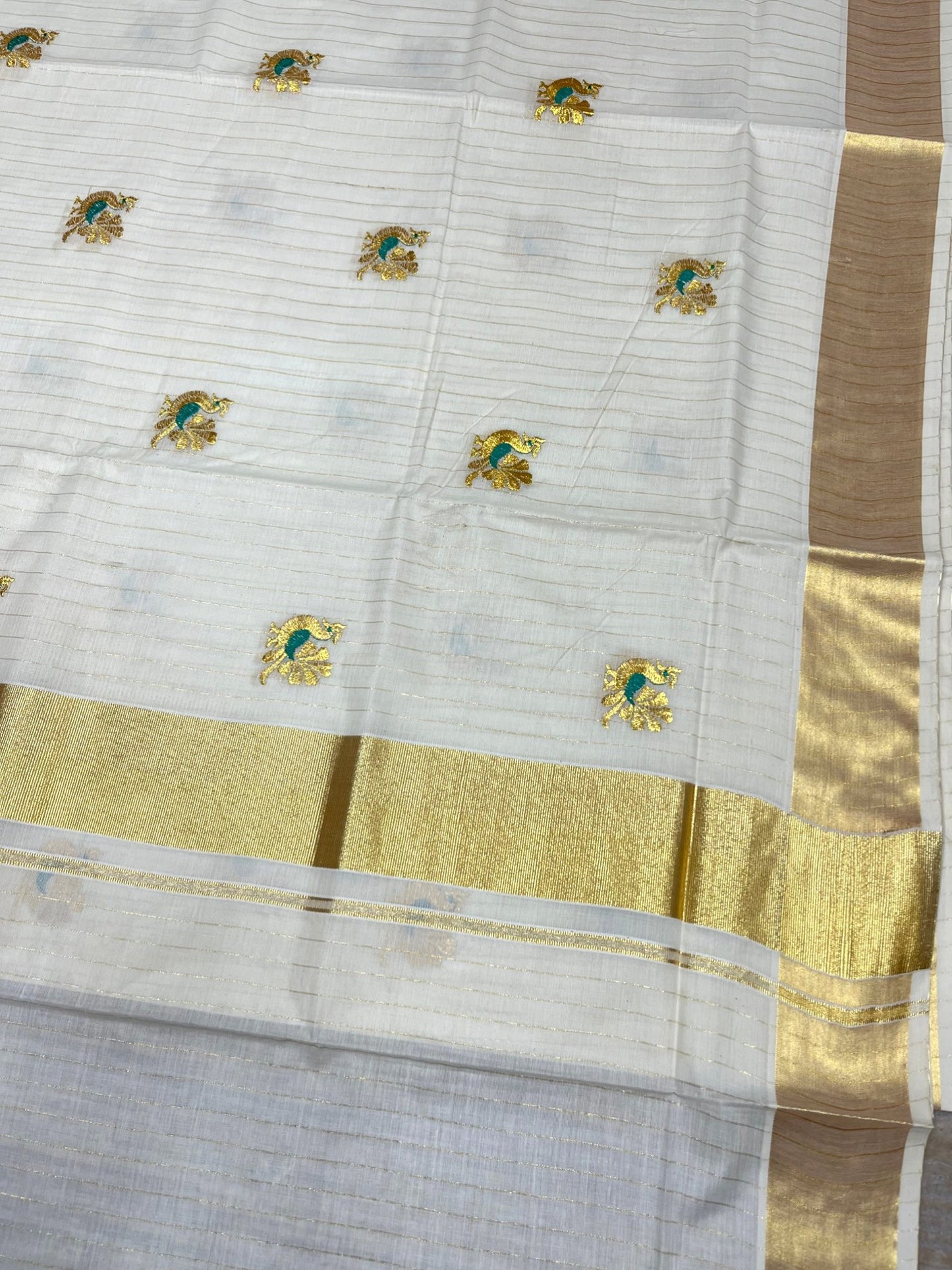 Southloom Cotton Kerala Kasavu Lines Saree with Peacock Embroidery Work on Body in Peacock Green