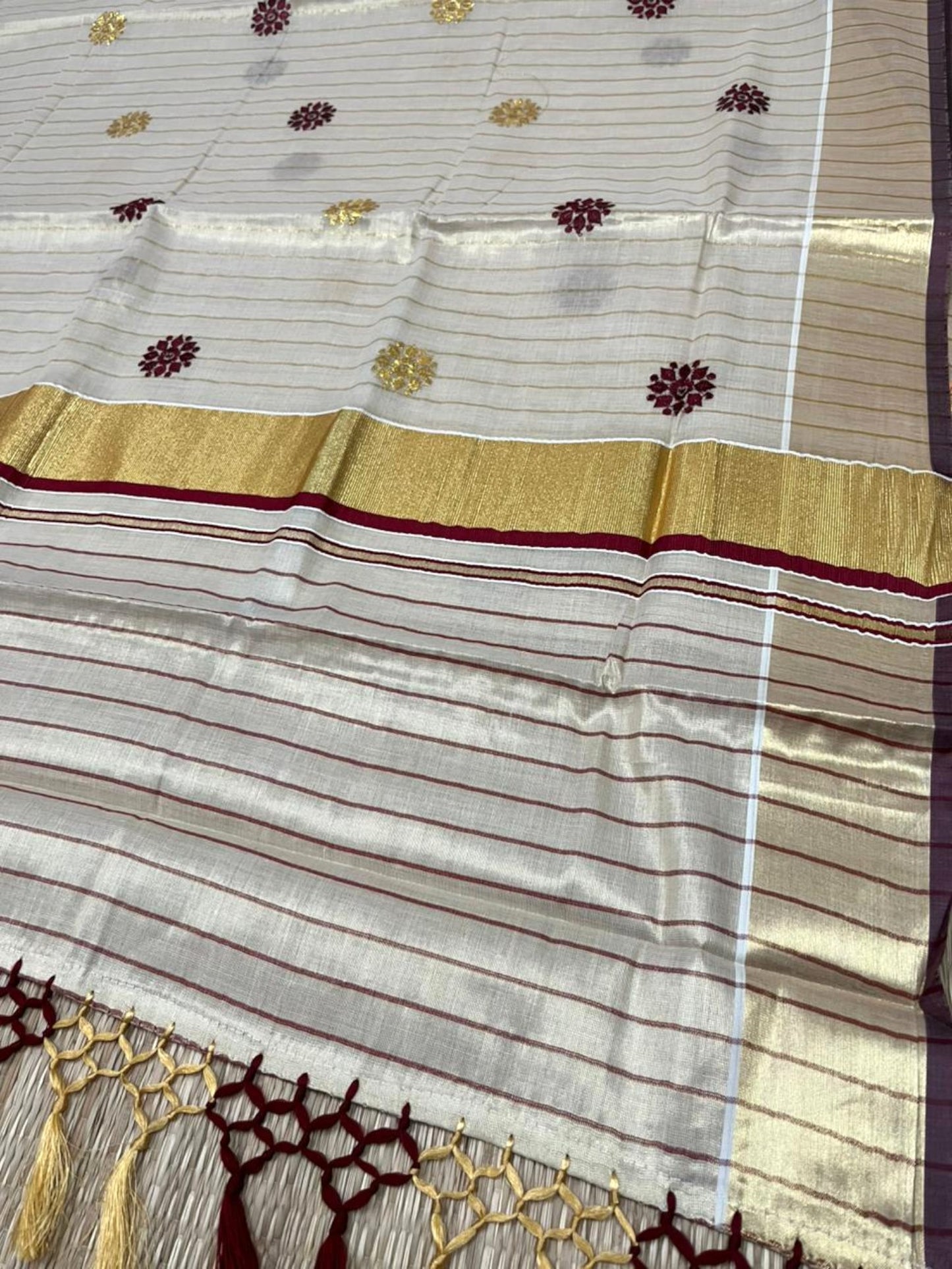 Kerala Tissue Lines Saree With Floral Embroidery Work on The Body In Maroon SL312