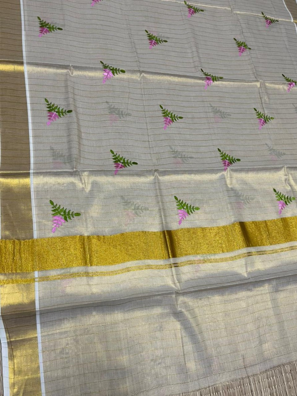 Southloom Kerala Tissue Pink And Green Floral Embroidery Design on the Body With Gold Kasavu