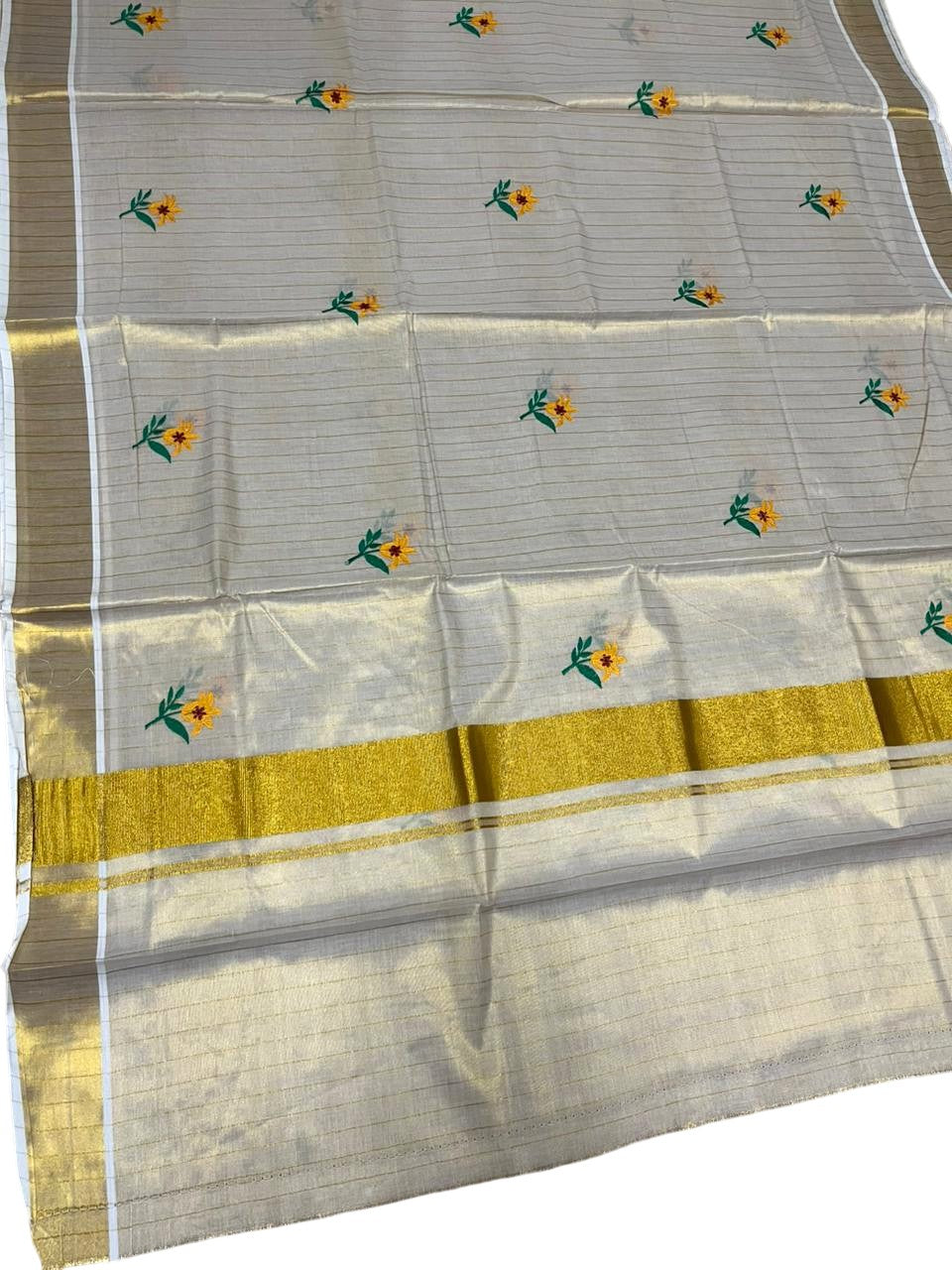 Southloom Kerala Tissue Yellow And Green Floral Embroidery Design on the Body With Gold Kasavu