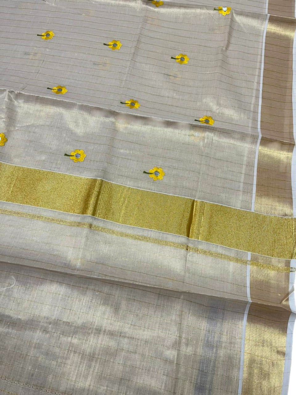 Southloom Kerala Tissue Yellow Floral Embroidery Design on the Body With Gold Kasavu