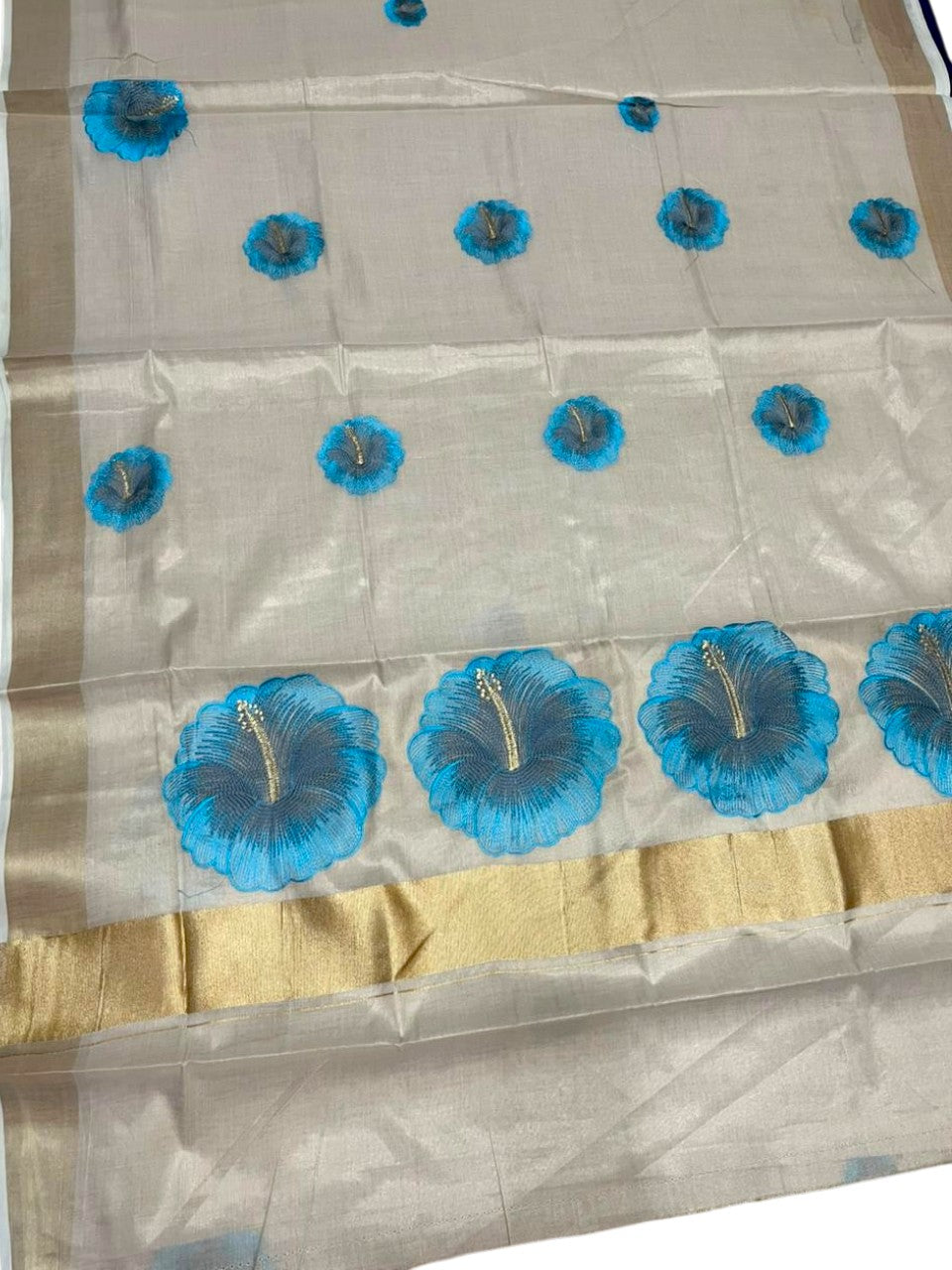 Southloom Kerala Tissue Kasavu Saree with Blue Floral Embroidery Design on Body SL434