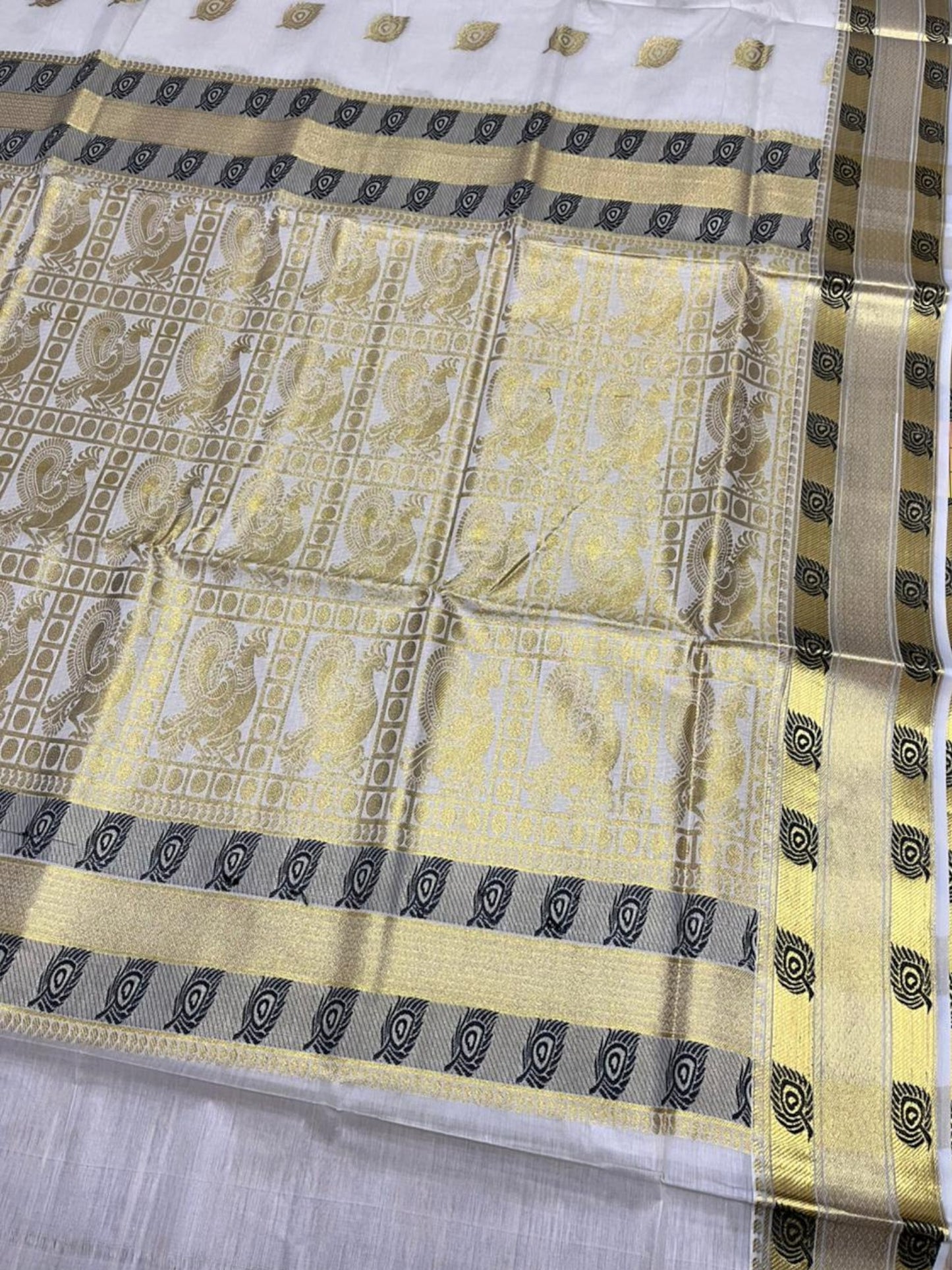 Southloom Pure Cotton Kerala Kasavu Heavy Work Saree with Peacock Feather Woven Design on Body and Borders SL490