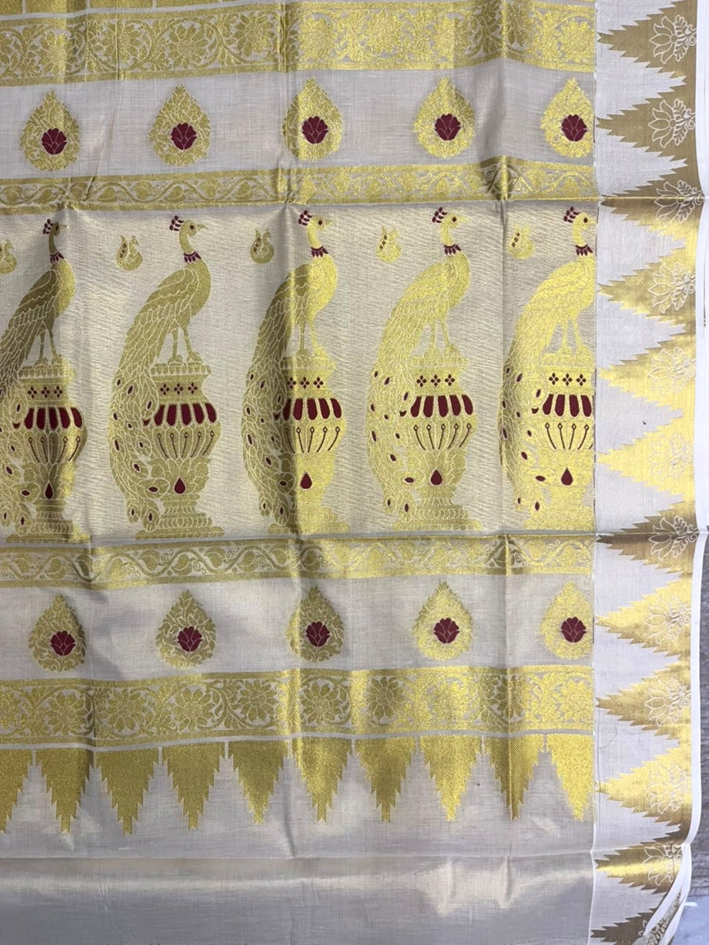 Southloom Tissue Kerala Kasavu Heavy Work Saree with Peacock Woven Design on Borders