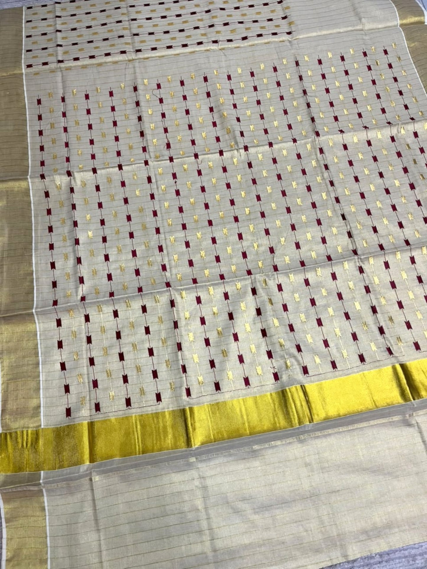 Southloom Tissue Kerala Kasavu Saree with Maroon& Gold Embroidery Designs on Body