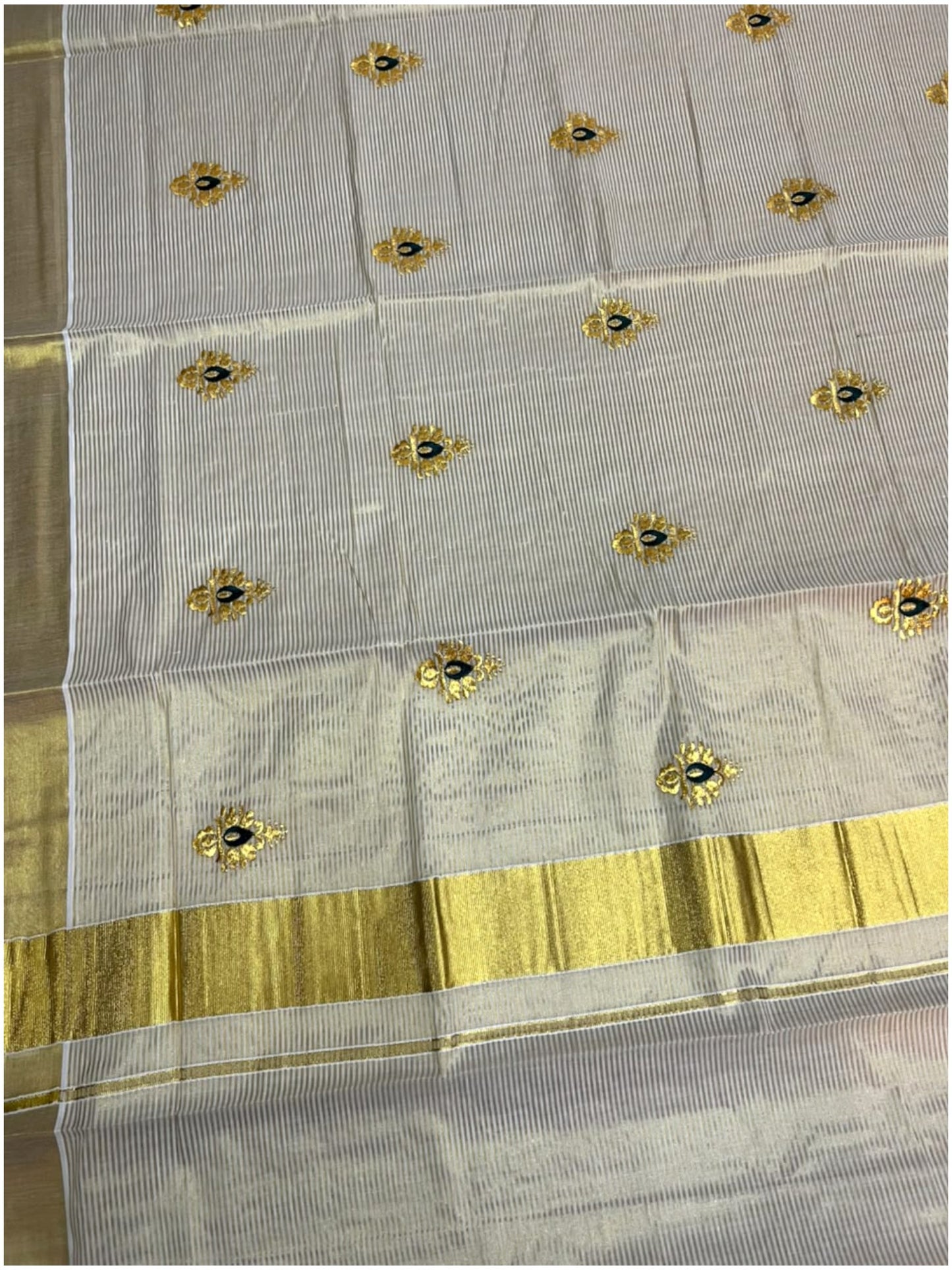 Southloom Tissue Kerala Kasavu Saree with Green & Gold Embroidery Designs on Body