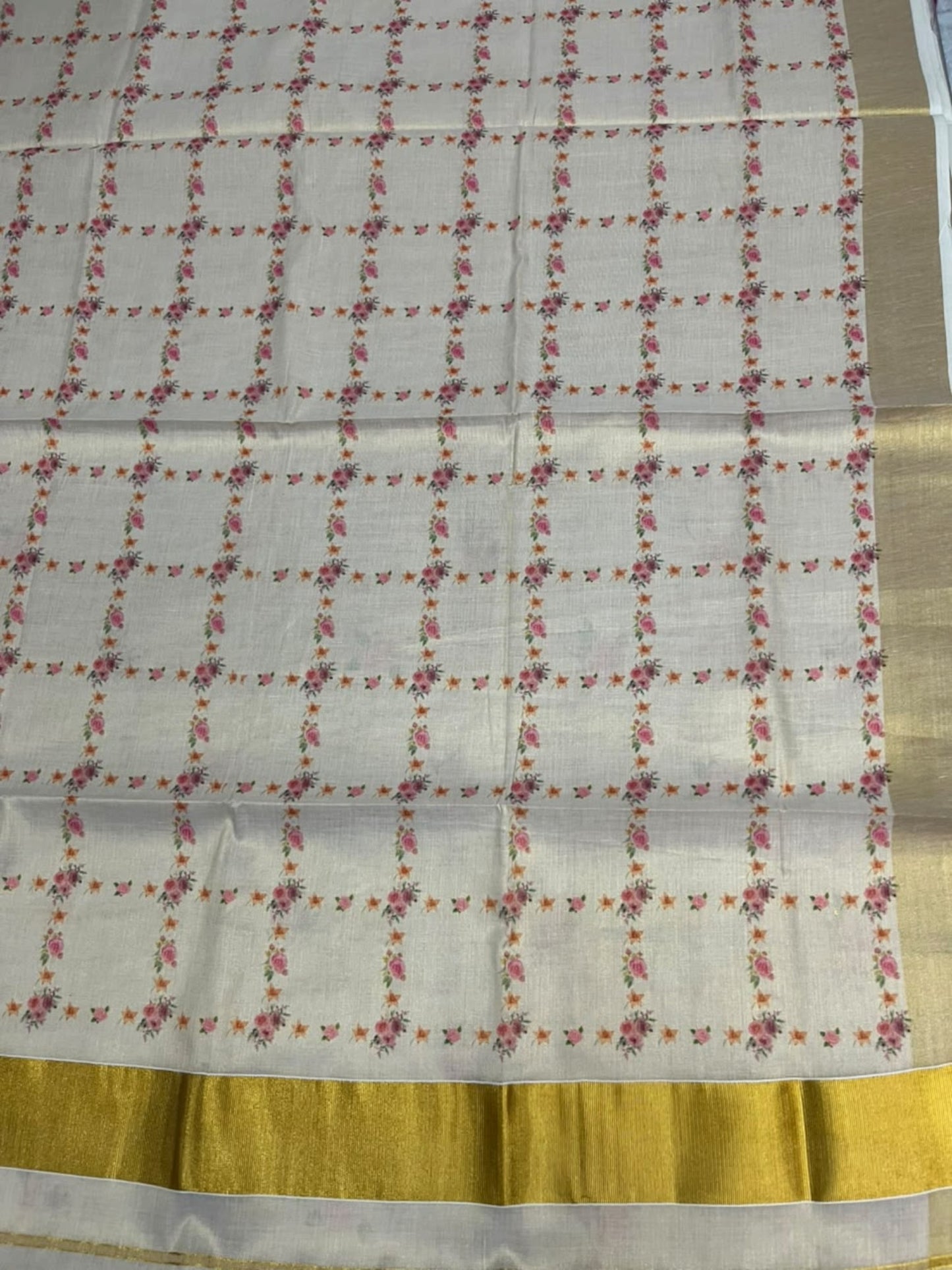 Southloom Tissue Kerala Kasavu Saree with Floral Printed Designs on Body in Border