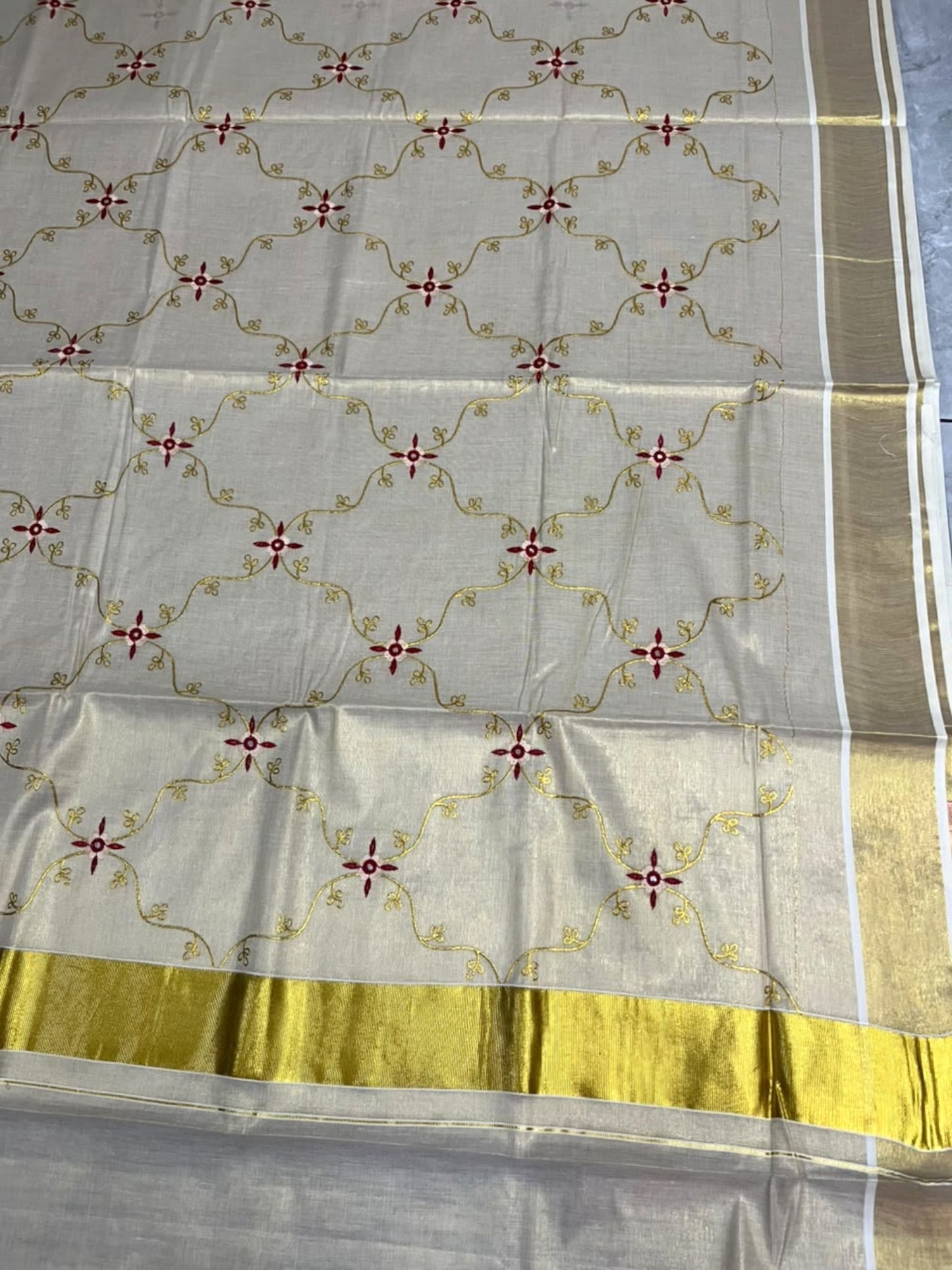 Southloom Tissue Kerala Kasavu Plain Saree with Embroidery Designs on Body