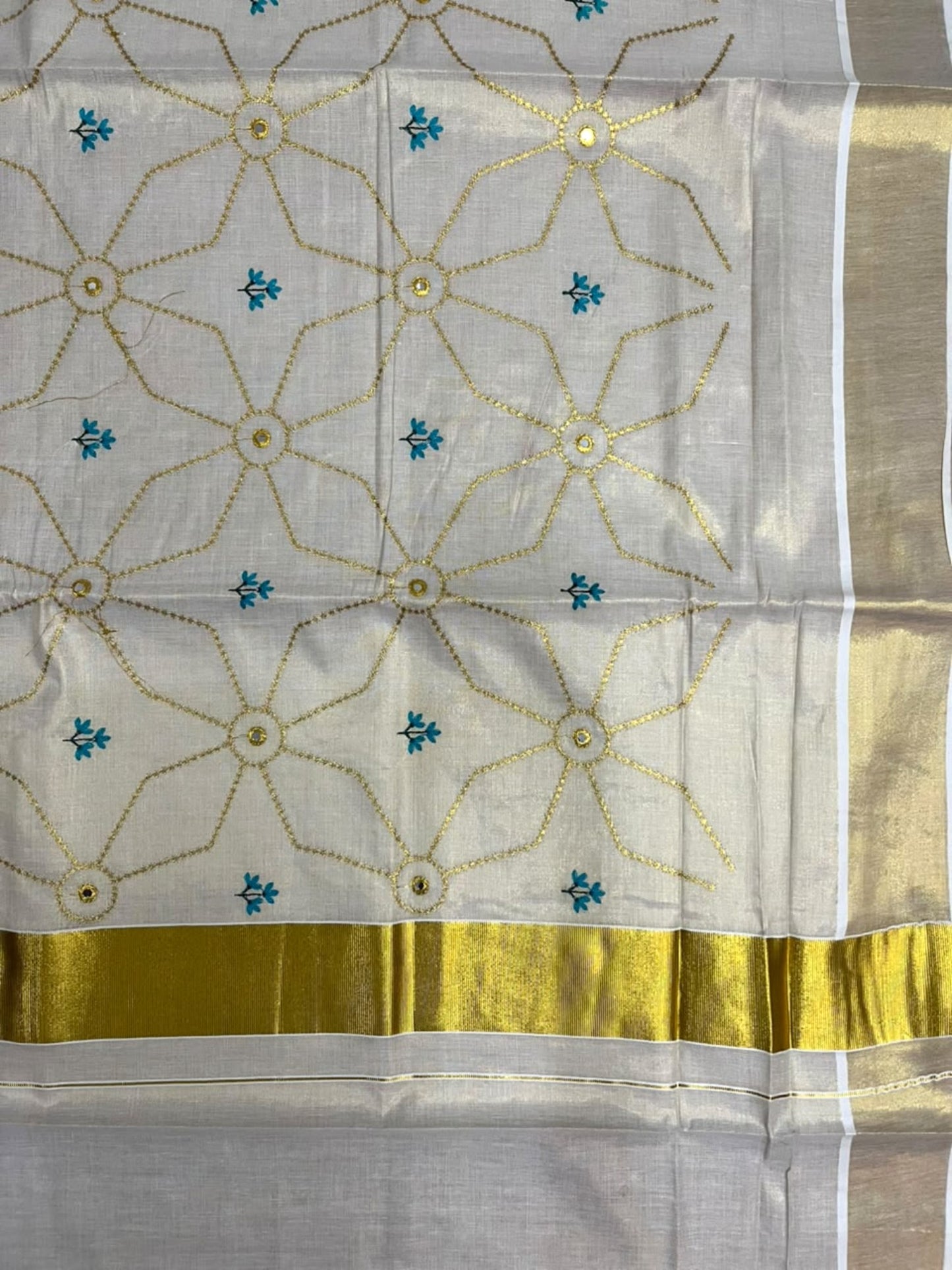Southloom Kerala Tissue Kasavu Saree with Floral Embroidery Work on Body in Blue