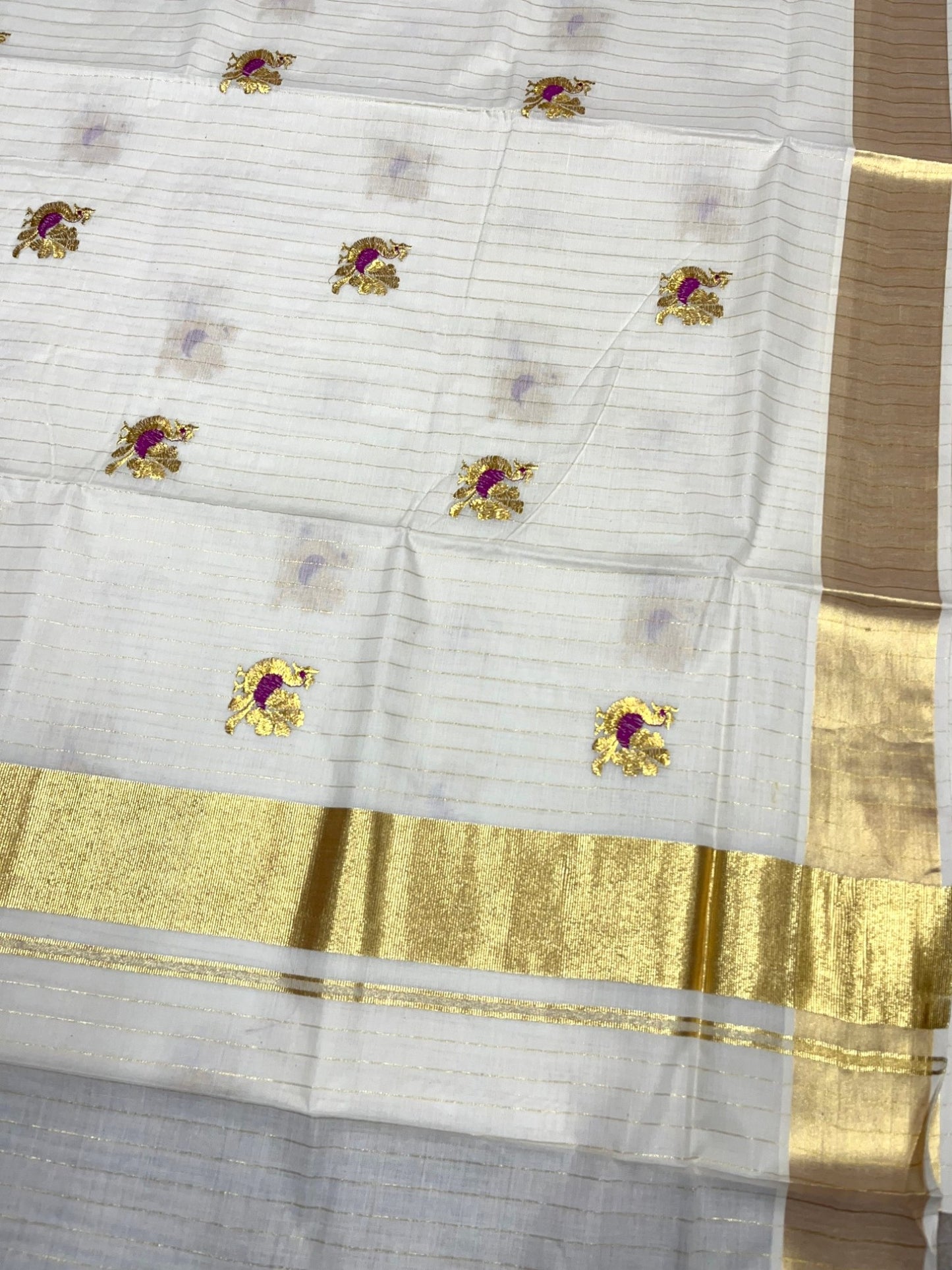 Southloom Cotton Kerala Kasavu Lines Saree with Peacock Embroidery Work on Body in Magenta