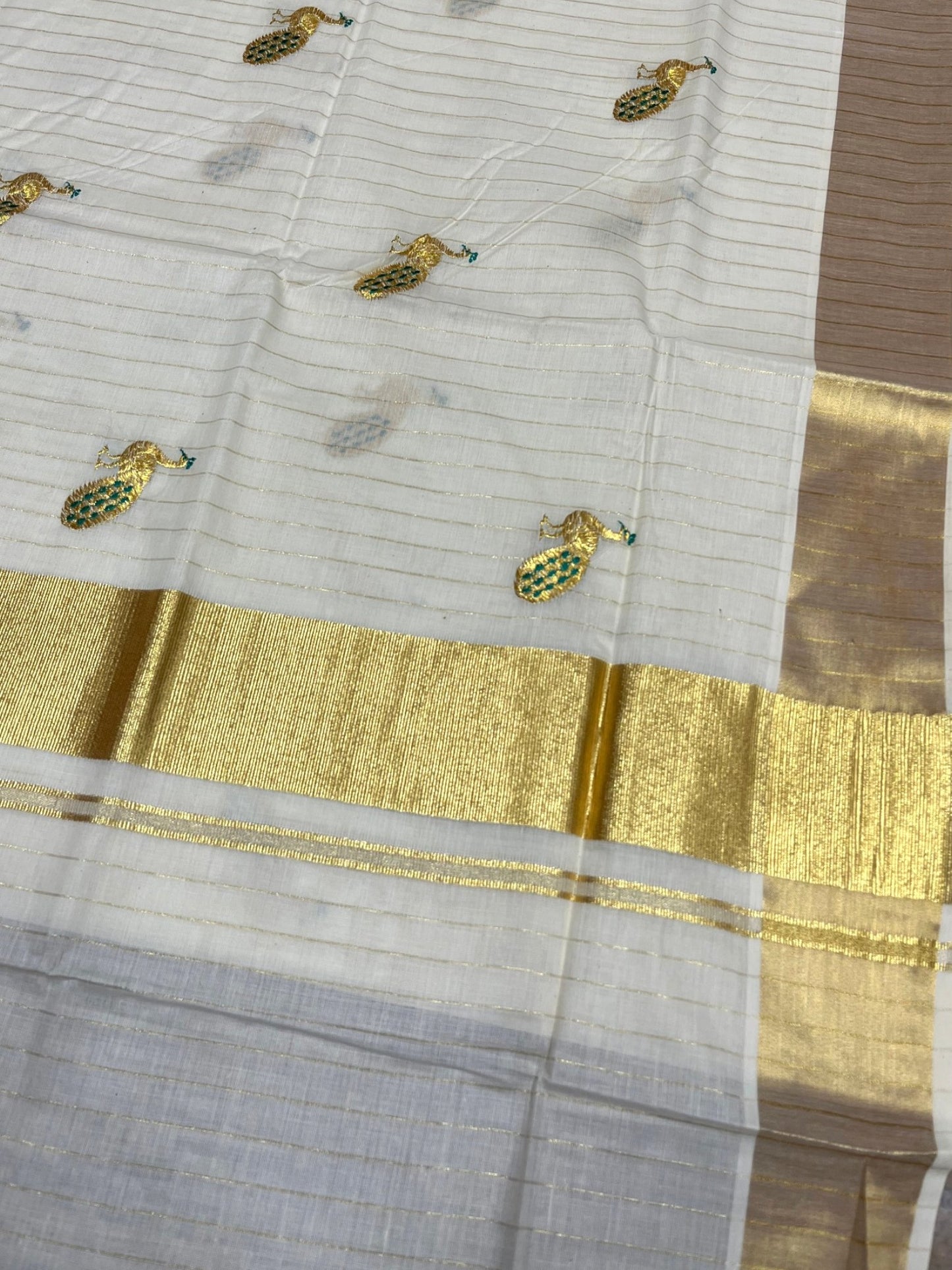 Southloom Cotton Kerala Kasavu Lines Saree with Peacock Embroidery Work on Body in Peacock Green