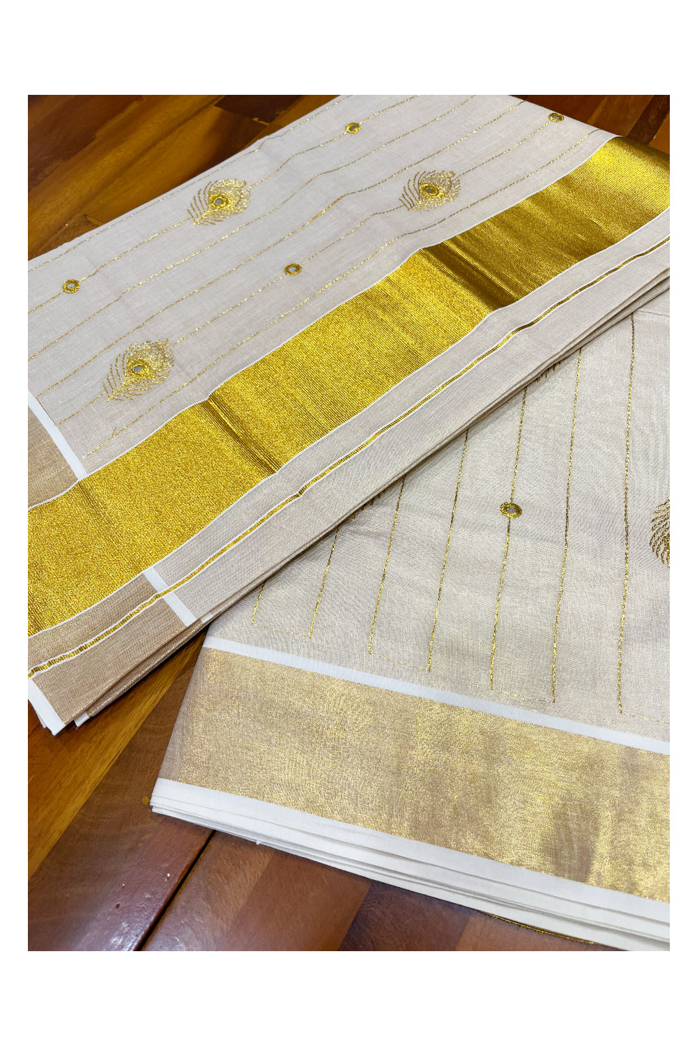 Kerala Tissue Kasavu Lines Saree with Feather Embroidary Works On Body