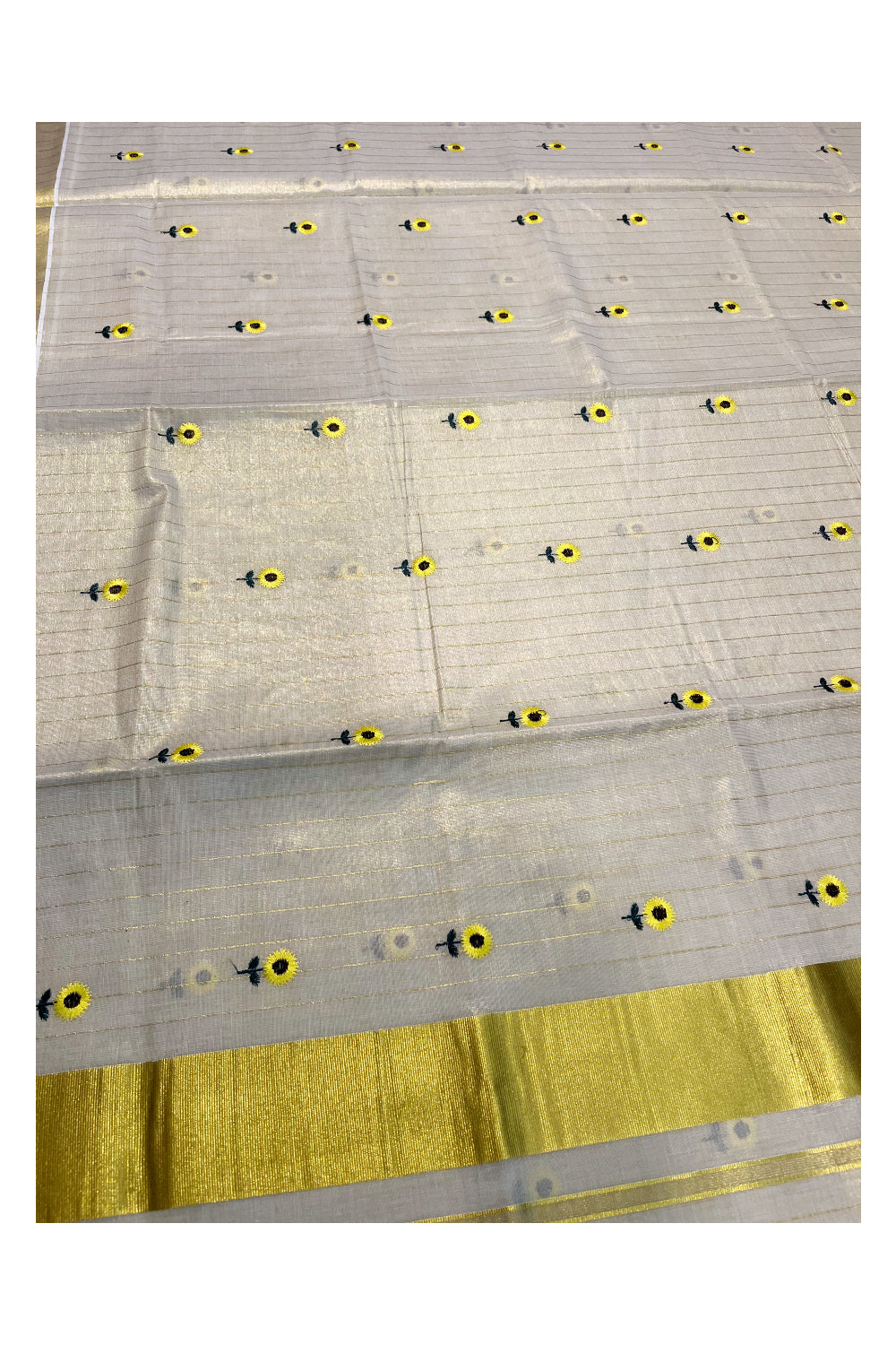 Kerala Tissue Kasavu Lines Saree with Yellow Floral Embroidary Work On Body