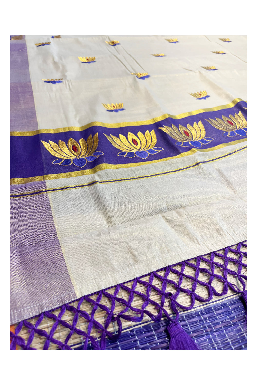 Southloom Kerala Tissue Kasavu Saree with Violet And Golden Lotus Embroidary Works on Body