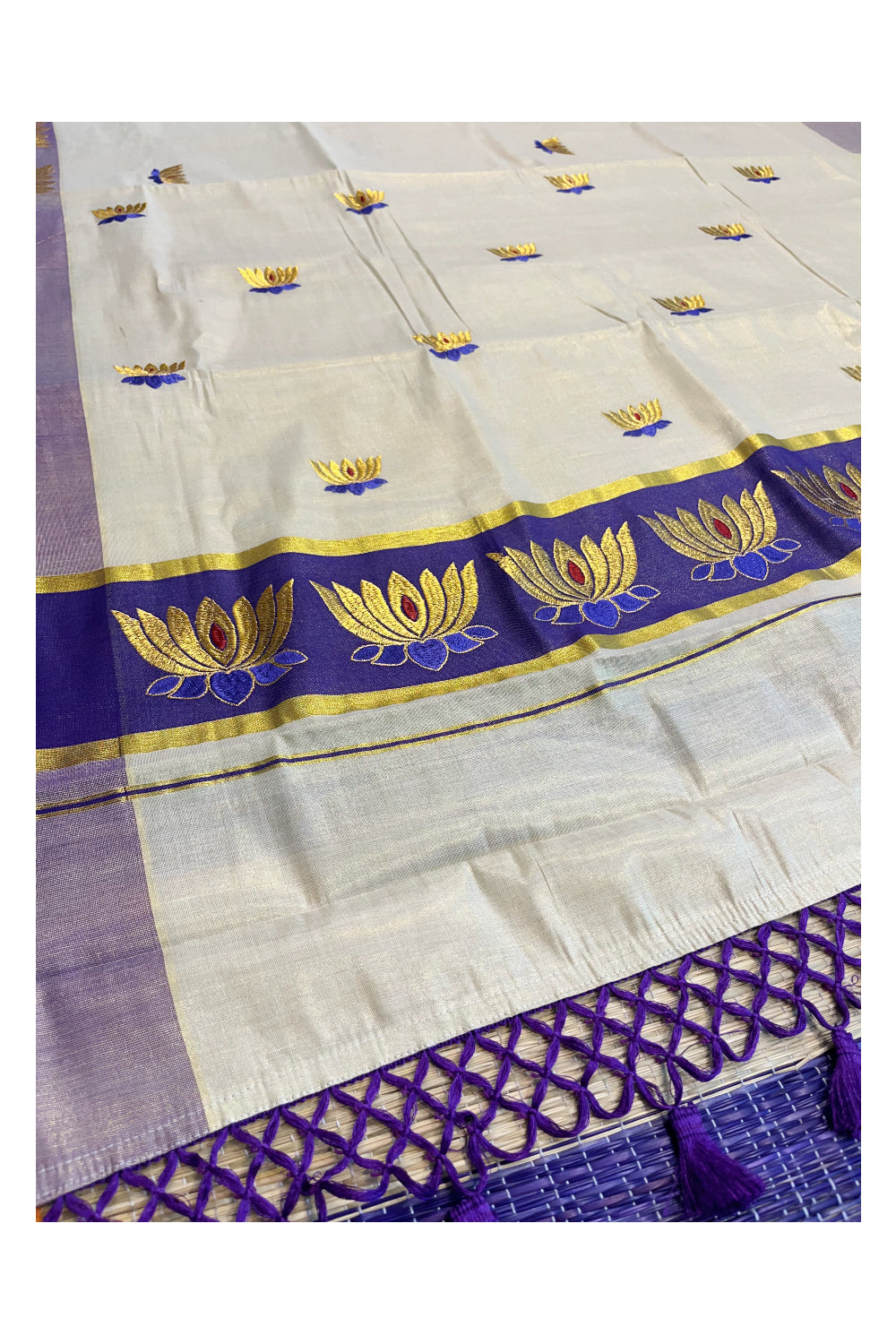 Southloom Kerala Tissue Kasavu Saree with Violet And Golden Lotus Embroidary Works on Body