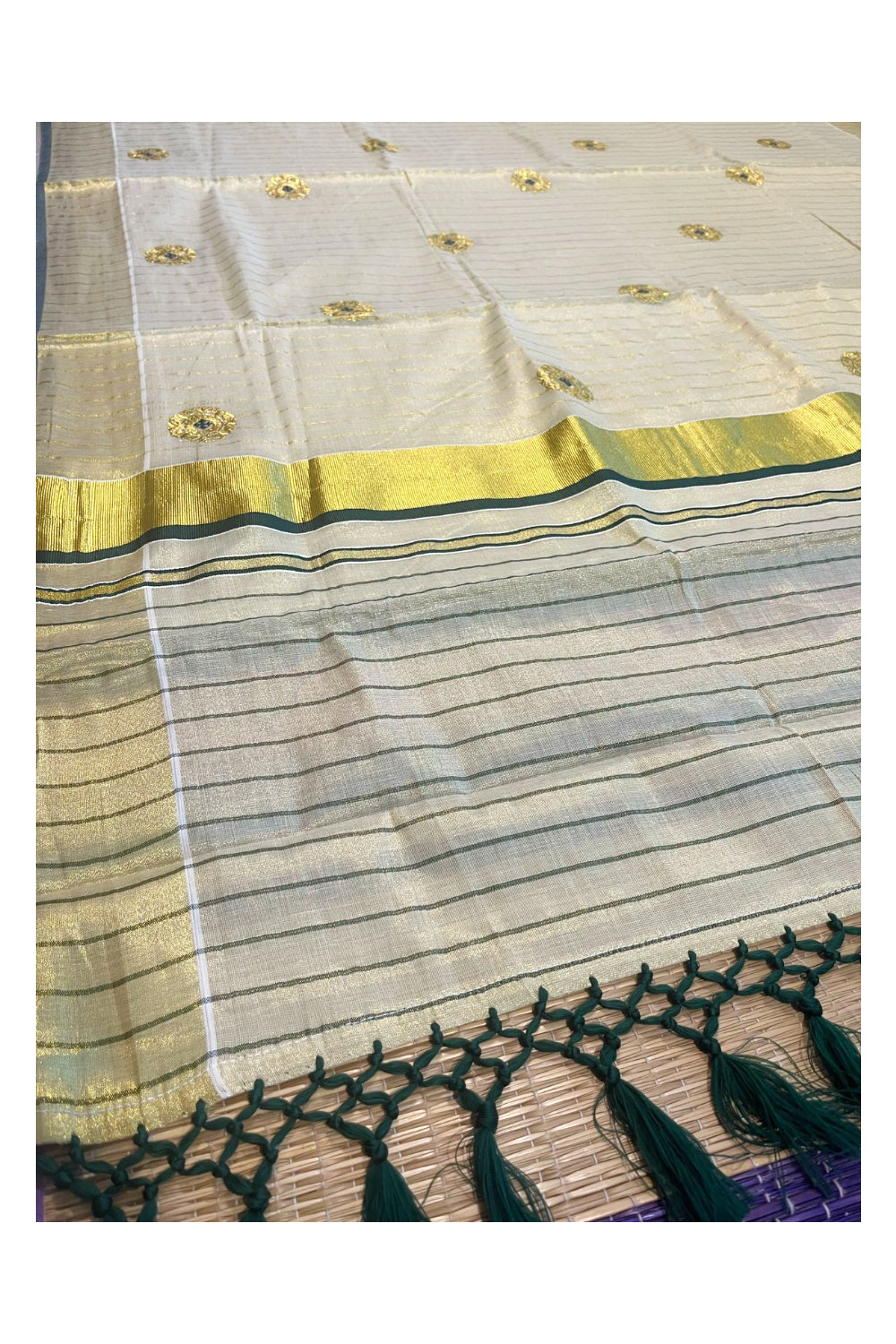 Kerala Tissue Kasavu Lines Saree with Golden And Green Embroidery Works