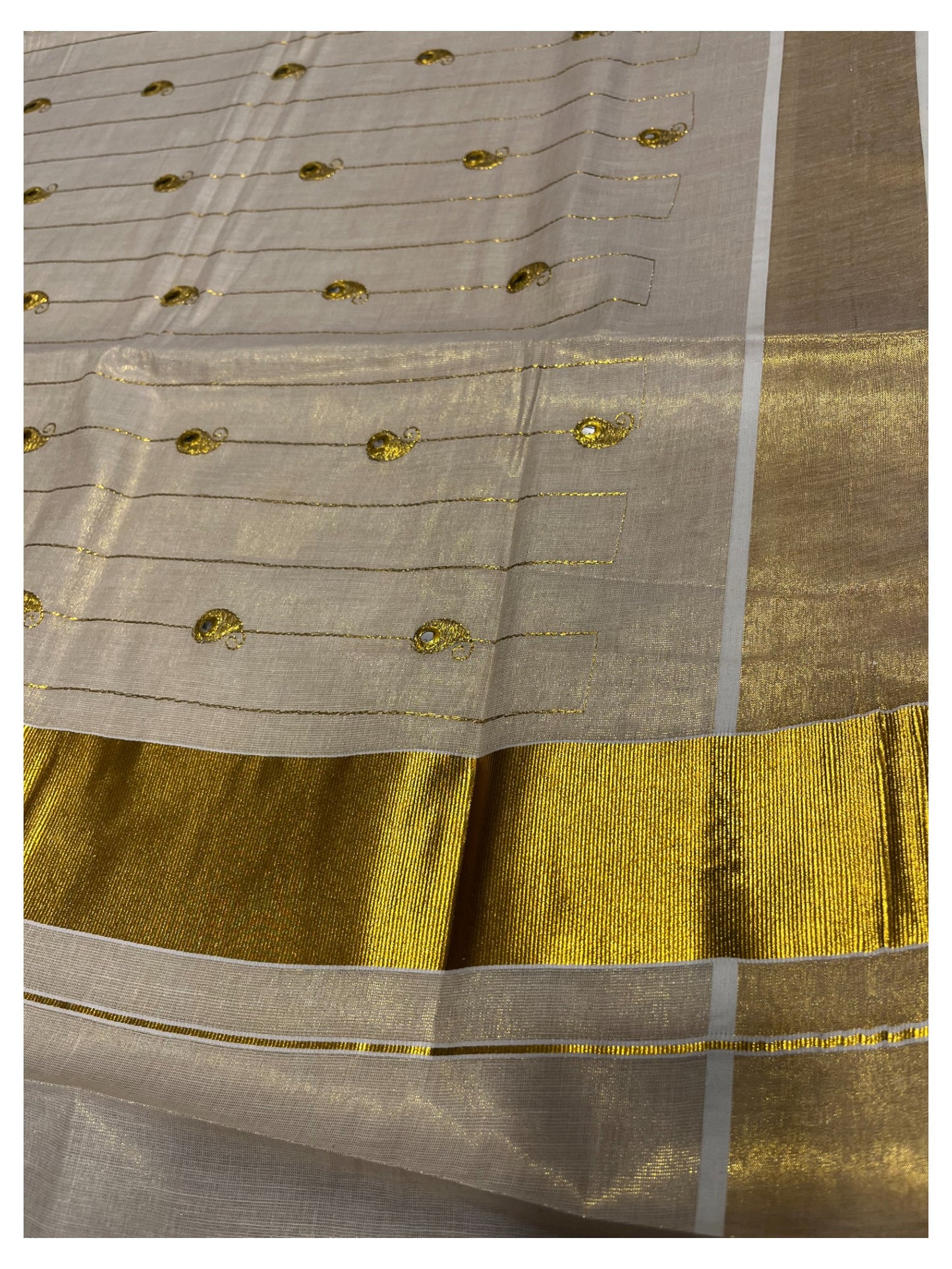 Kerala Tissue Kasavu Saree with Golden Embroidery Works