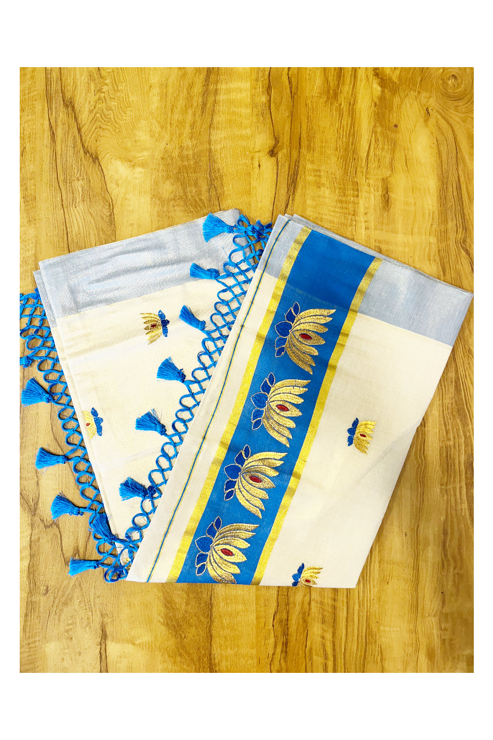 Southloom Kerala Tissue Kasavu Saree with Blue And Golden Lotus Embroidary Works on Body
