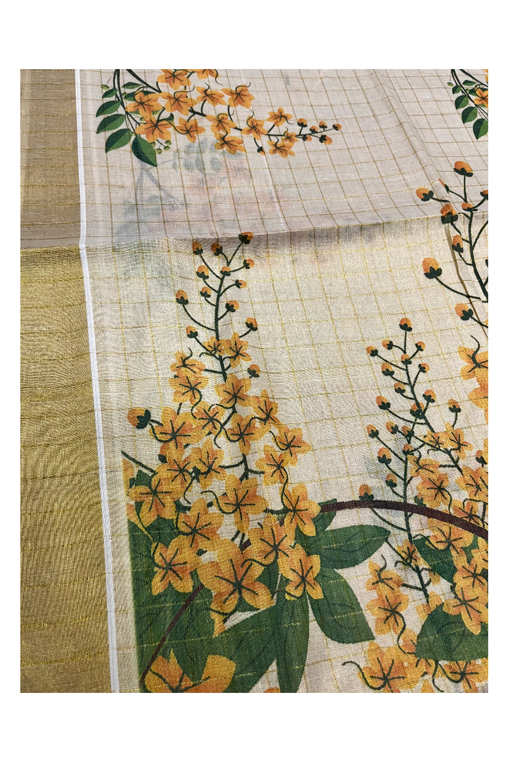 Kerala Tissue Kasavu Check Design Saree with Kanikonna Floral Prints on Body