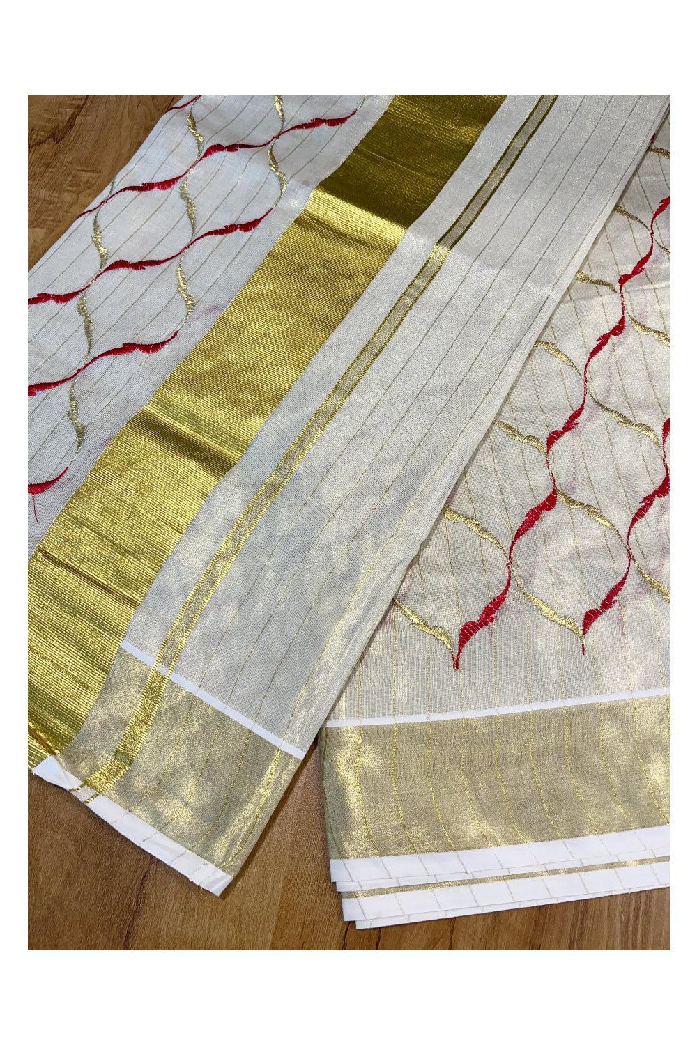 Southloom Kerala Tissue Kasavu Lines Saree with Red and Golden Floral Embroidery Designs