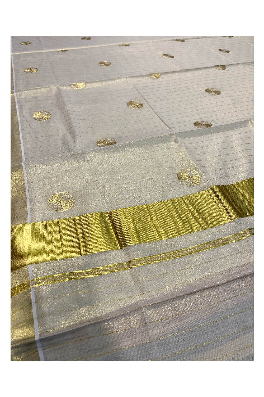 Kerala Tissue Kasavu Lines Saree with Golden Polka works across the Body