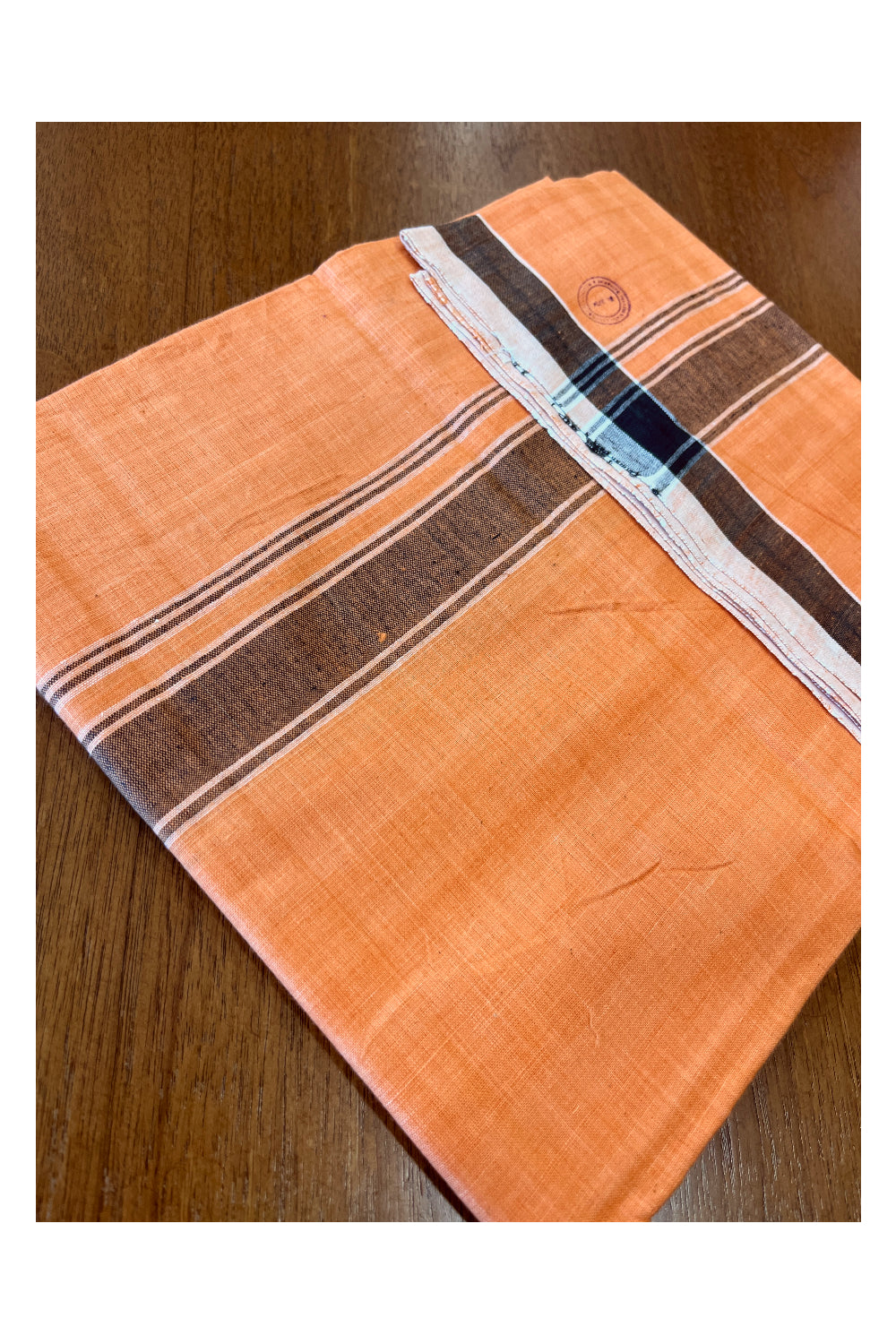 Southloom Premium Handloom Saffron (Kaavi) Solid Single Mundu (Lungi) with Black Border (South Indian Kerala Dhoti)