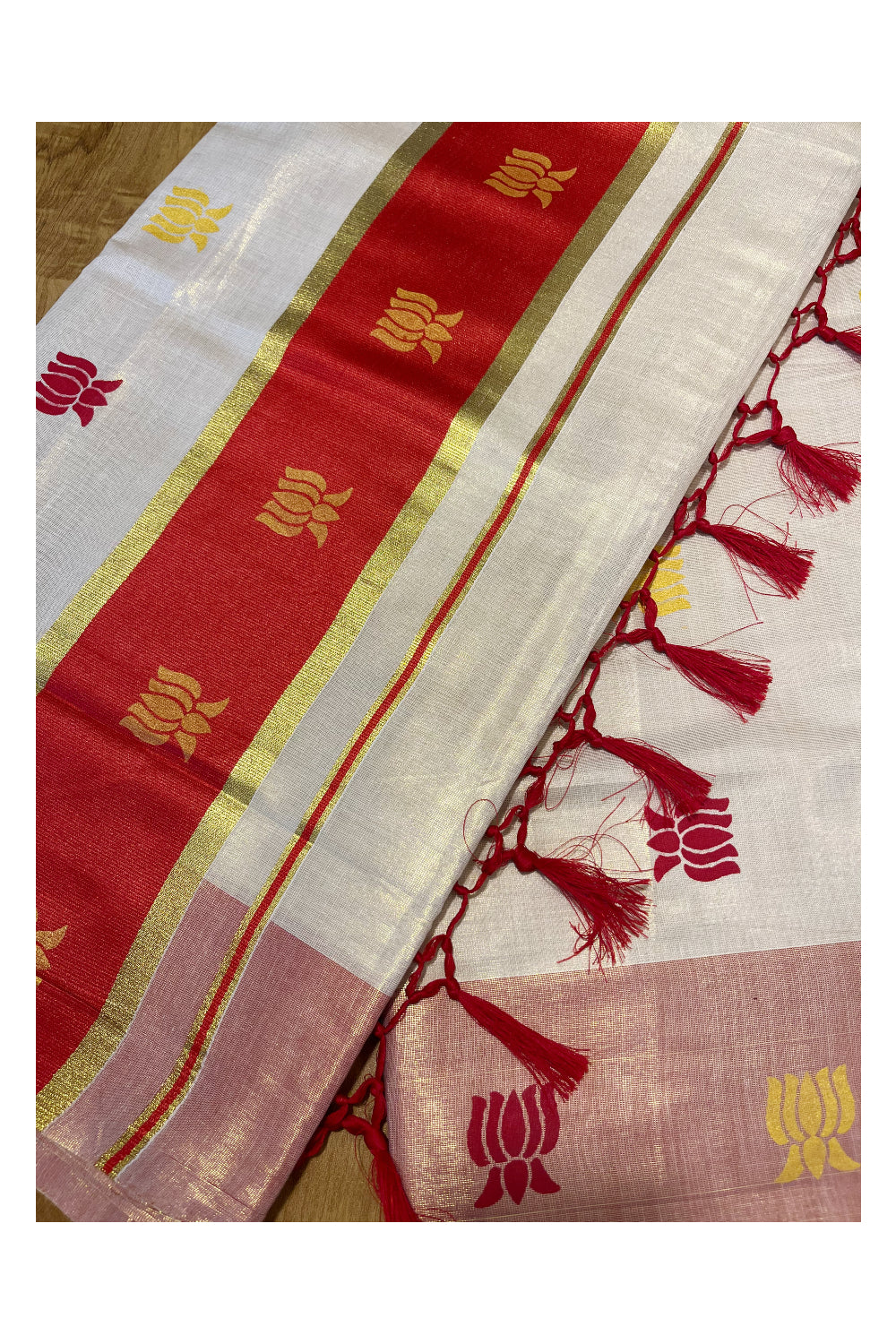 Kerala Tissue Kasavu Saree with Red And Golden Lotus Design On Border