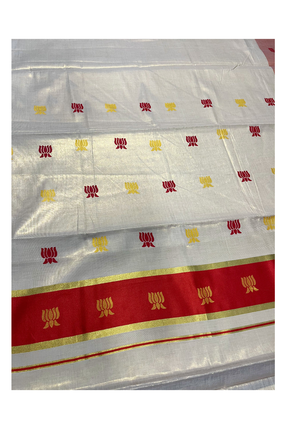 Kerala Tissue Kasavu Saree with Red And Golden Lotus Design On Border