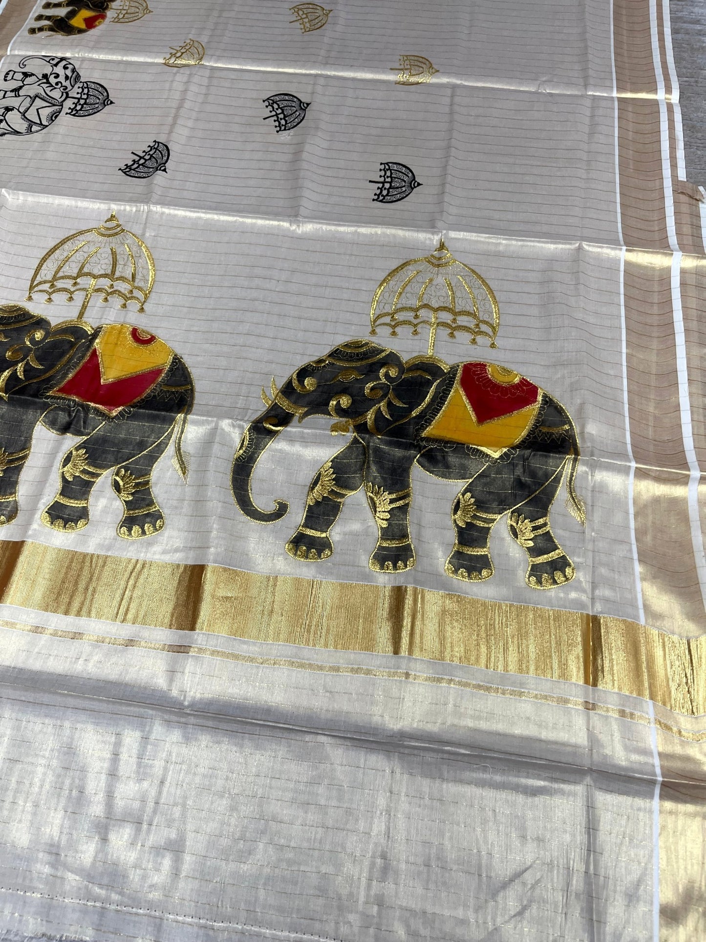 Southloom Kerala Tissue Kasavu Lines Saree with Elephant Handpainted and Embroidery Work