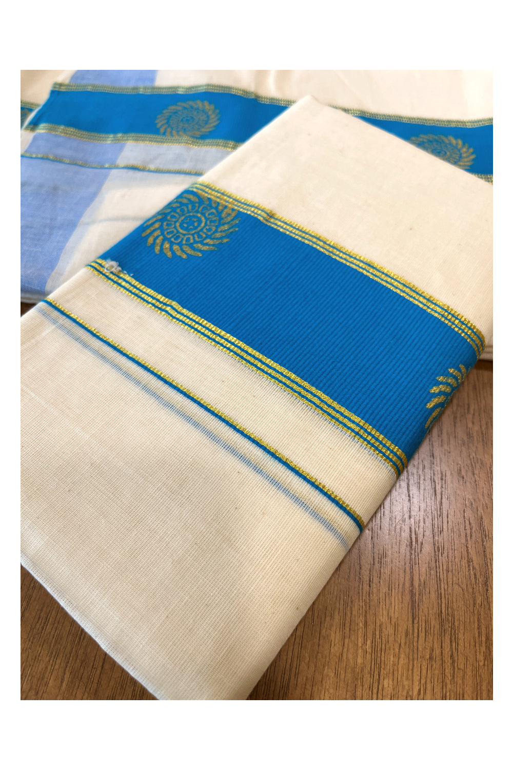 Cotton Single Set Mundu (Mundu Neriyathum) with Golden Block Prints on Light Blue Border