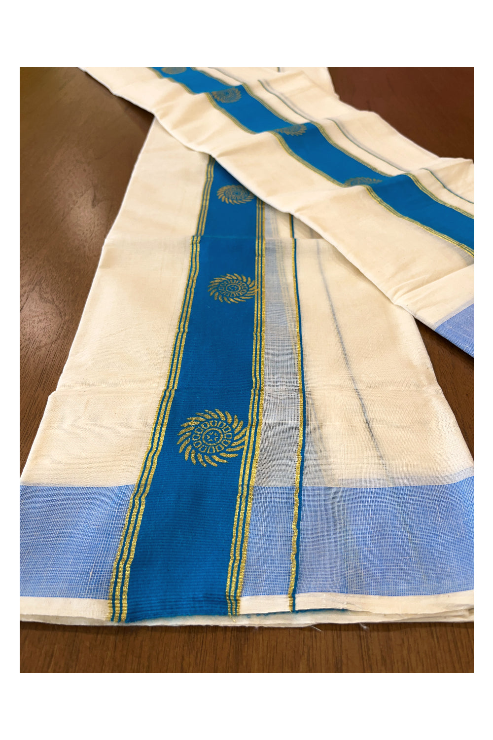 Cotton Single Set Mundu (Mundu Neriyathum) with Golden Block Prints on Light Blue Border