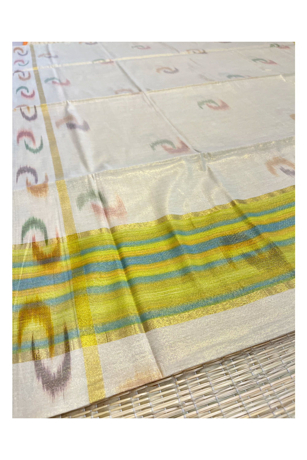 Southloom Kerala Tissue Kasavu Saree with Multi Colour Pochampally Design on Borders and Kara