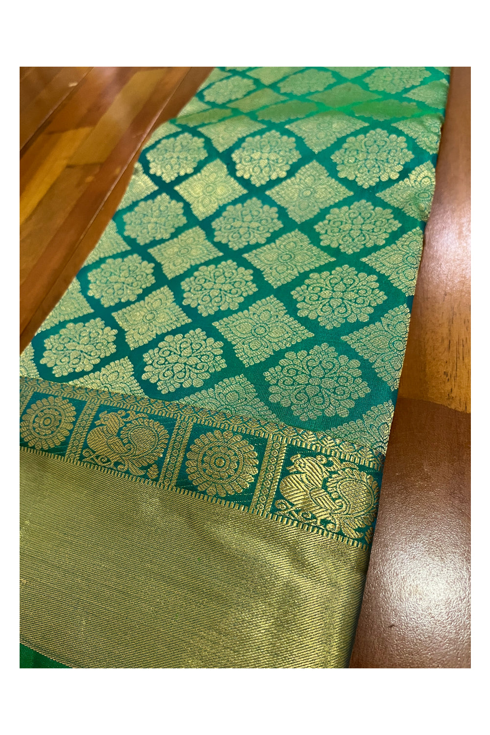 Southloom Double Warp Handloom Pure Silk Kanchipuram Green Manthrakodi Saree with Kasavu Woven Works