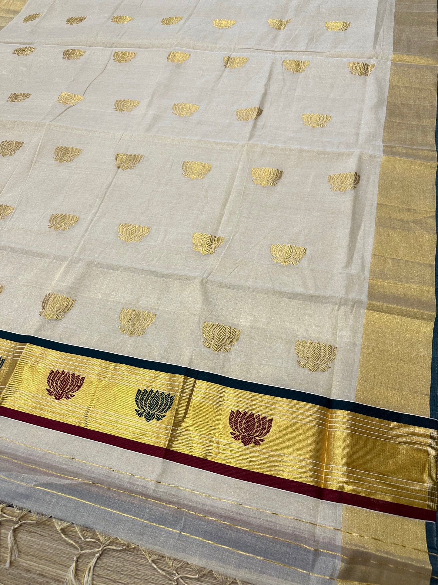 Southloom Premium Handloom Tissue Kasavu Saree with Green, Gold and Maroon Lotus Woven Designs