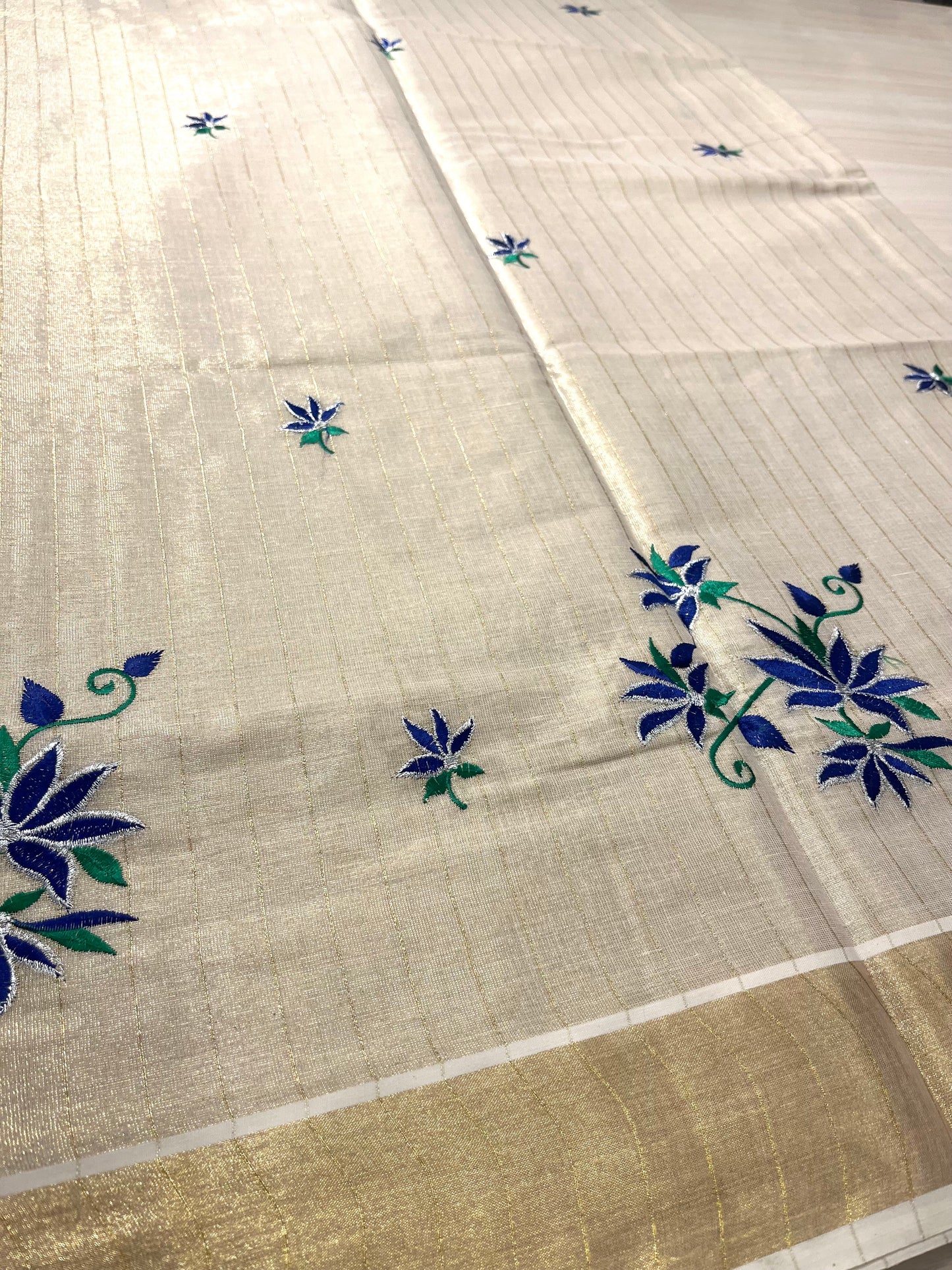 Kerala Tissue Saree With Blue Floral Embroidery SL143