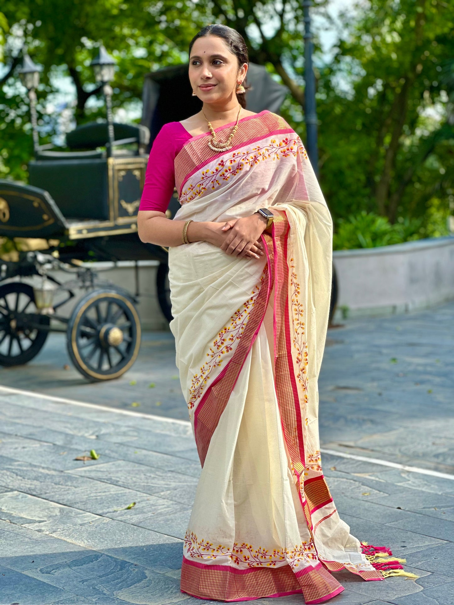 Southloom Pink Floral Print Saree with Kasavu Check Borders