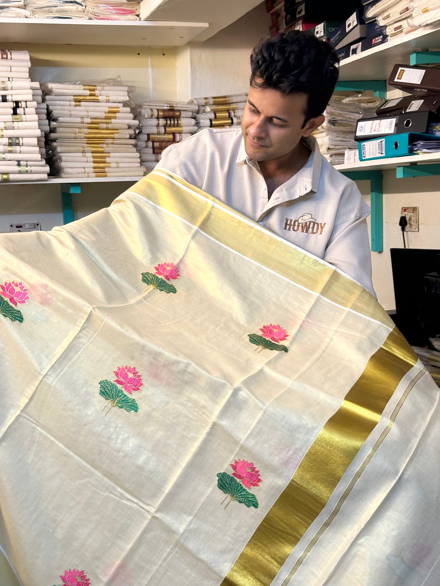 Southloom Lotus Pink and Green Embroidery Tissue Kerala Saree