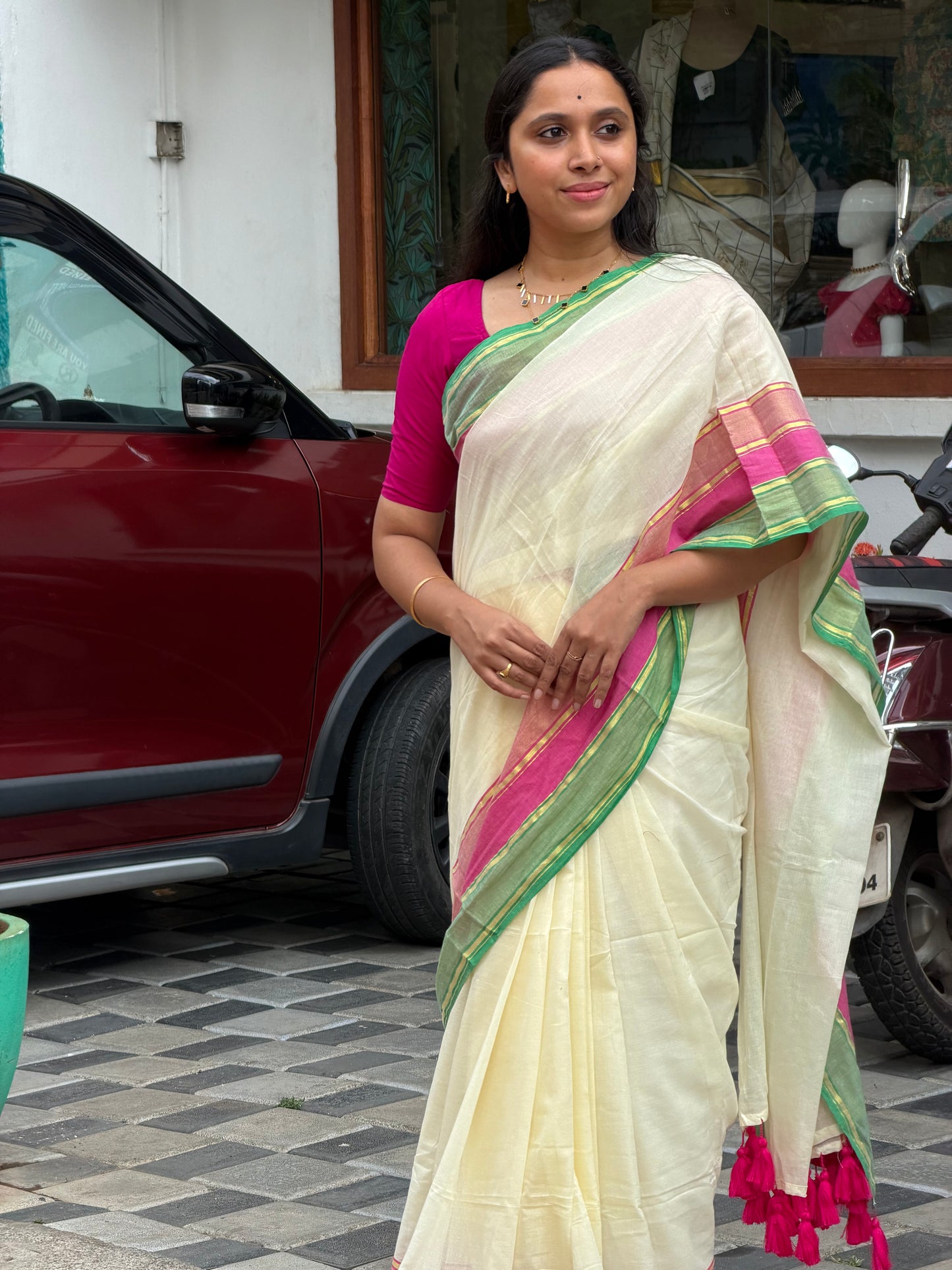 Kerala Mul Cotton Soft Fabric Saree SL215 Pink and Green Kasavu Border with Pink and Green Tussels