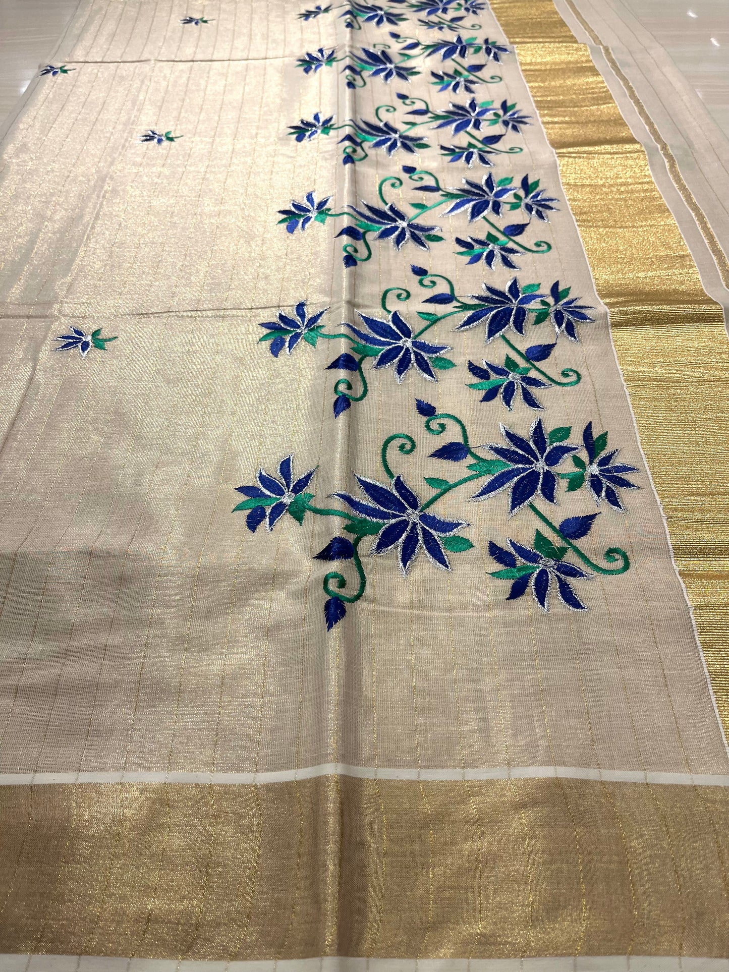 Kerala Tissue Saree With Blue Floral Embroidery SL143