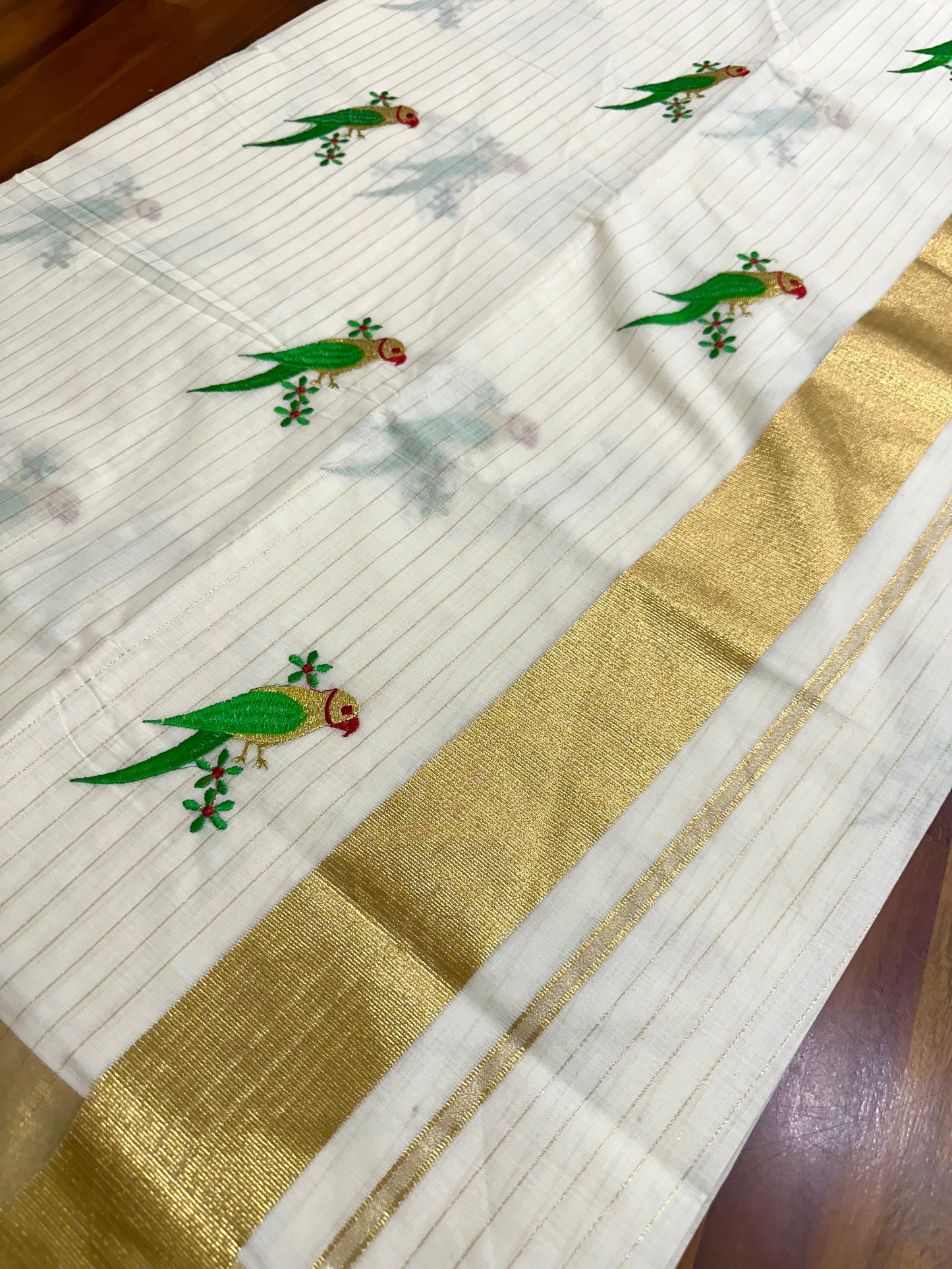 Southlooom Parrot Embroidery Kasavu Kerala Saree with Lines Across Body 🦜