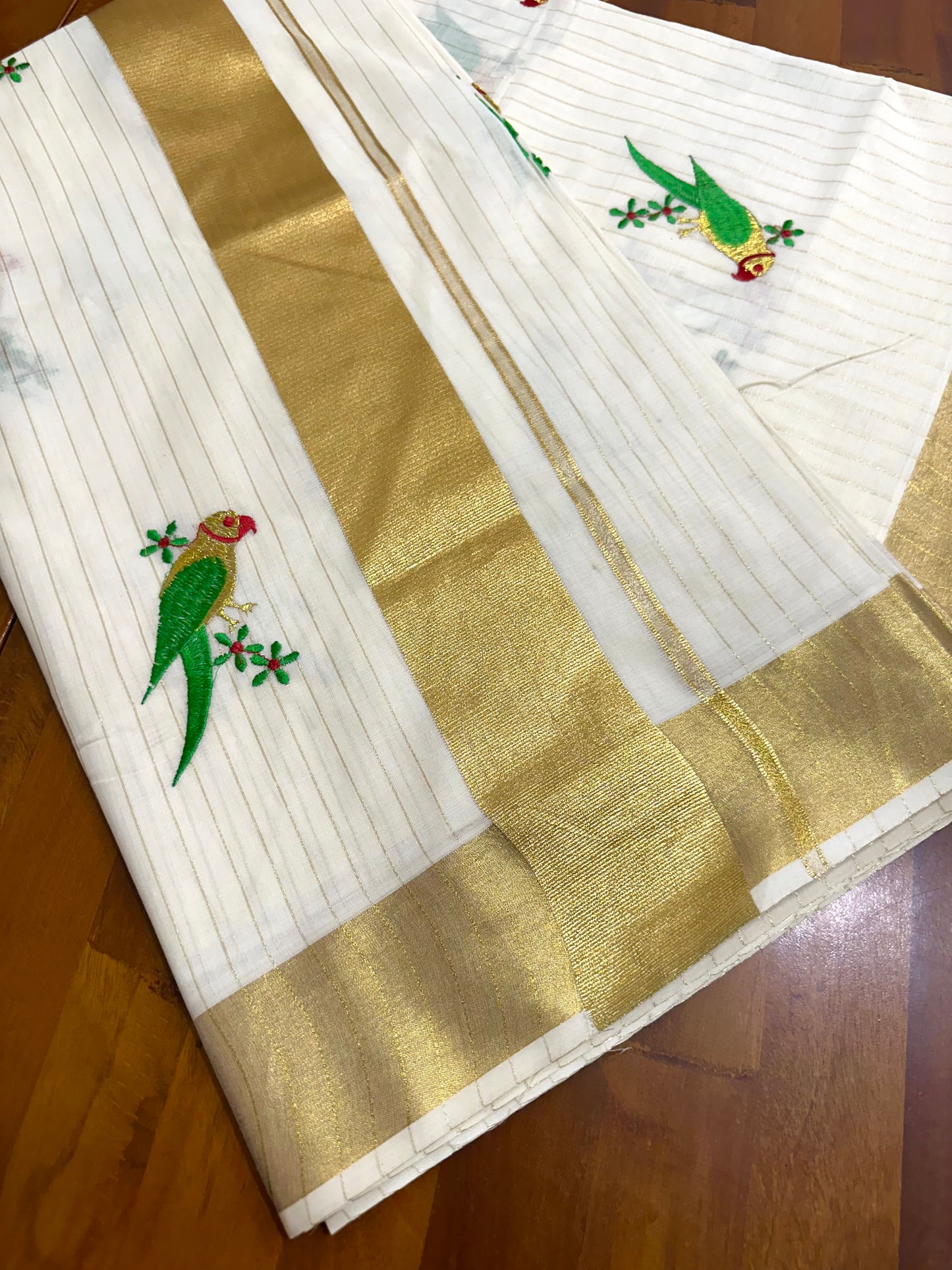 Southlooom Parrot Embroidery Kasavu Kerala Saree with Lines Across Body 🦜