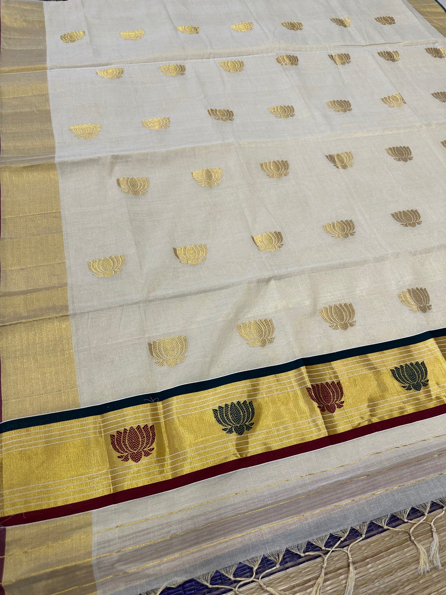 Southloom Premium Handloom Tissue Kasavu Saree with Green, Gold and Maroon Lotus Woven Designs