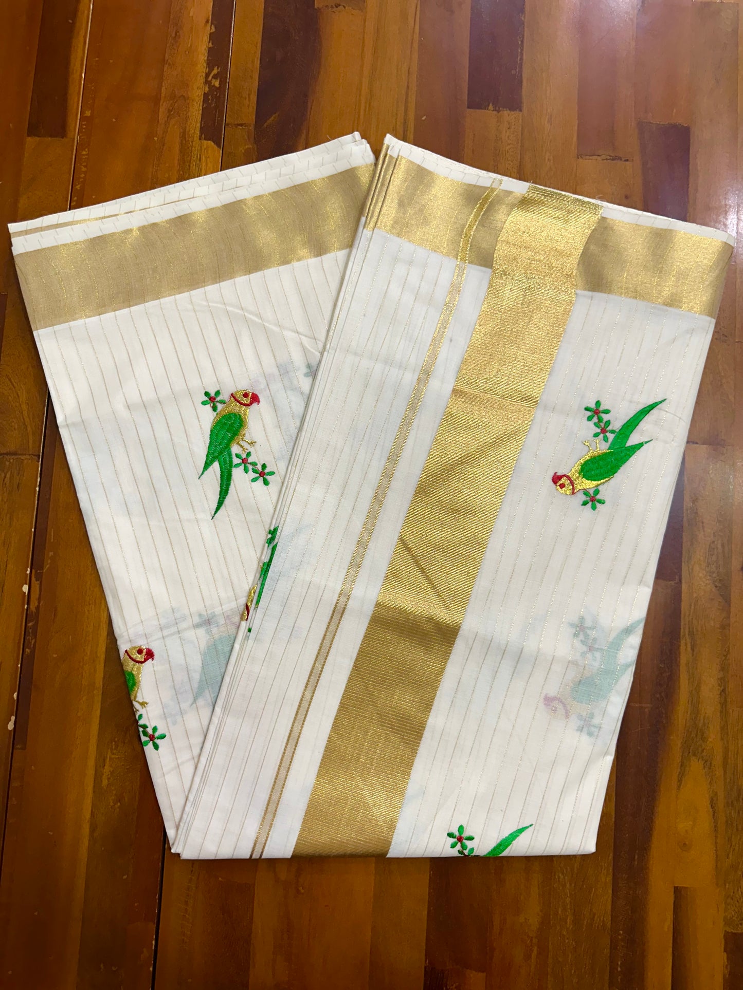 Southlooom Parrot Embroidery Kasavu Kerala Saree with Lines Across Body 🦜