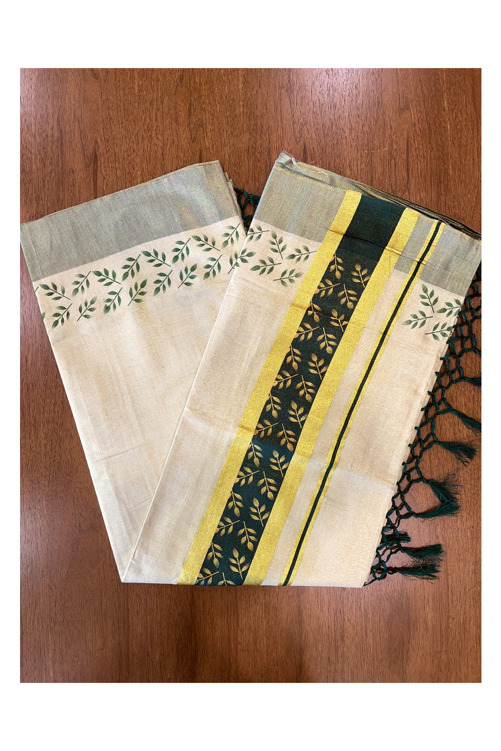 Kerala Tissue Kasavu Saree with Golden and Green Block Prints on Border and Tassels Works