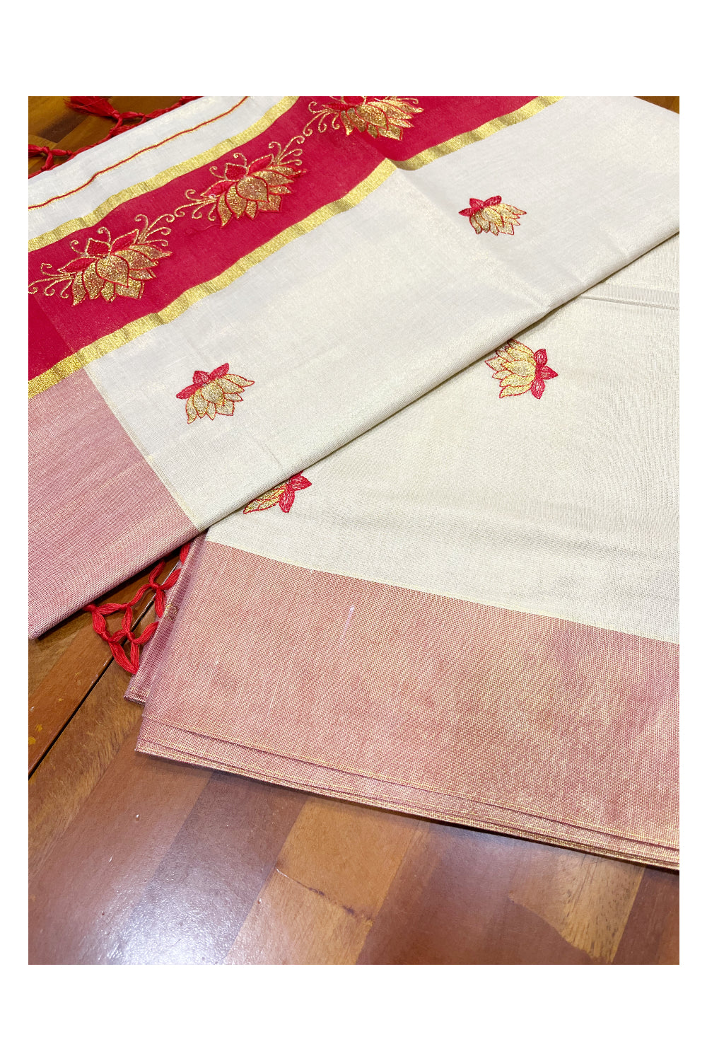 Southloom Kerala Tissue Kasavu Saree with Red And Golden Lotus Embroidary Designs on Body