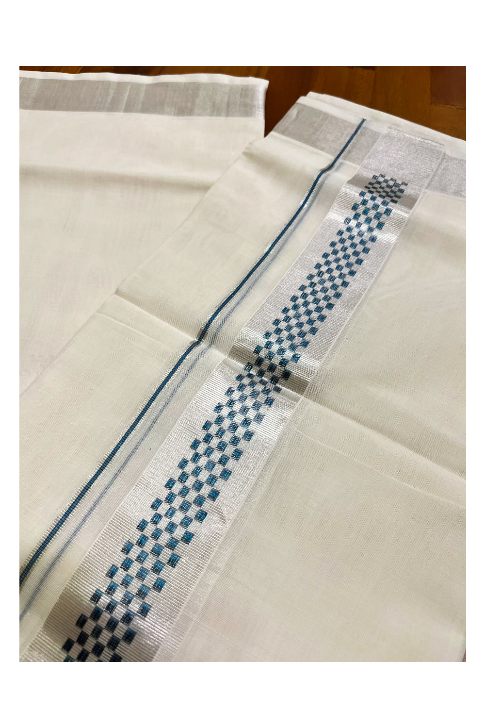 Southloom Premium Handloom Pure Cotton Mundu with Silver and Blue Kasavu Woven Border