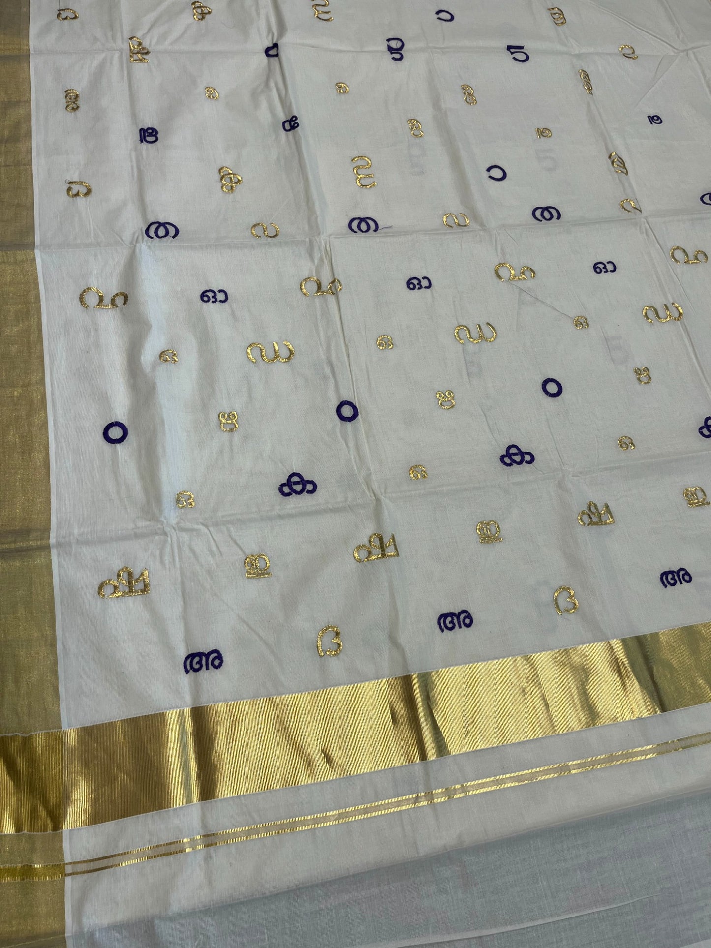 Southloom Kerala Cotton Kasavu Saree with Gold and Violet Malayalam Aksharamala Embroidery Work on Body
