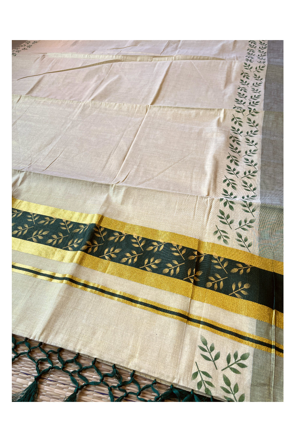 Kerala Tissue Kasavu Saree with Golden and Green Block Prints on Border and Tassels Works