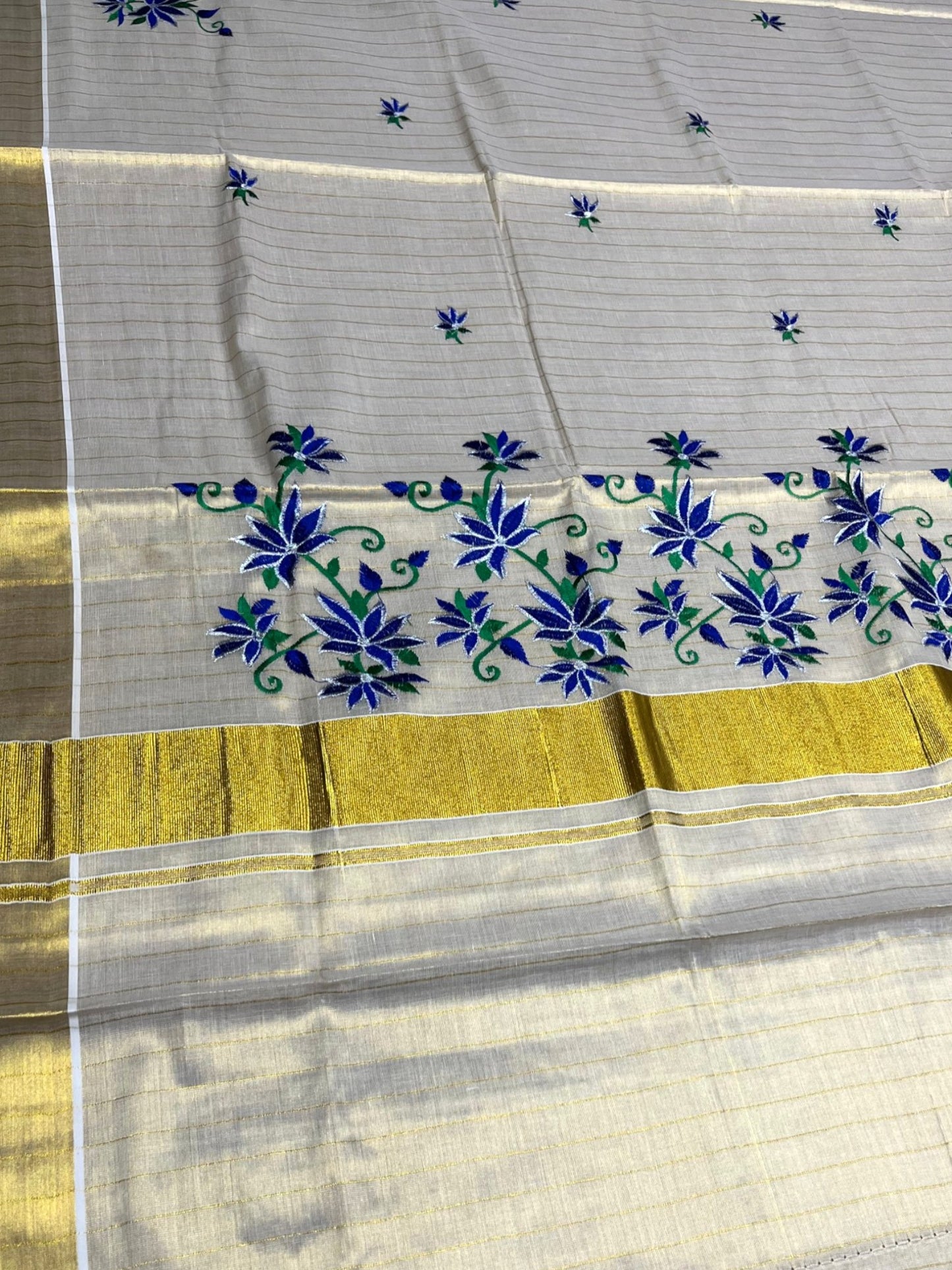 Southloom Tissue Kerala Kasavu Lines Saree with Floral Embroidery Design in Blue